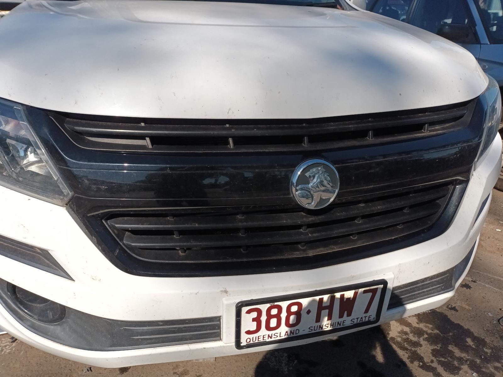 A White Car with a License Plate That Says 388HW7 — South West 4WD Wreckers in Harristown, QLD