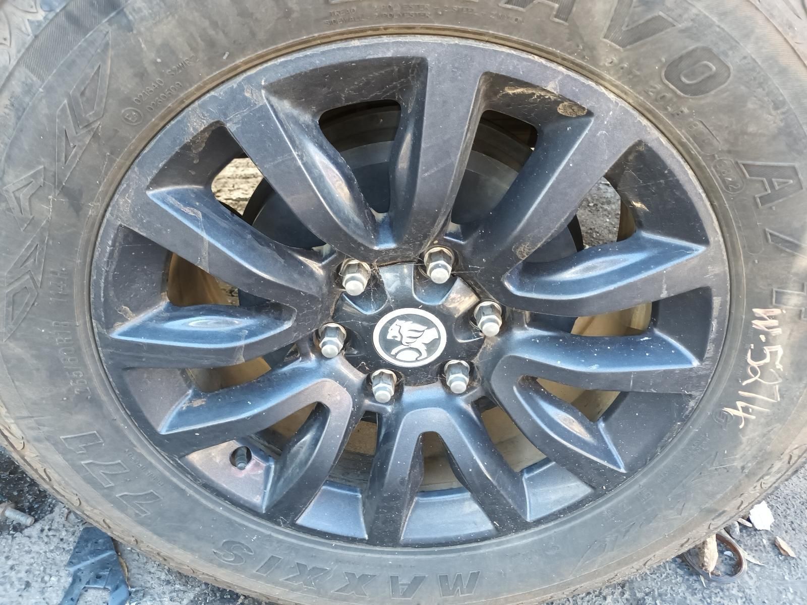 A Close Up of a Car Wheel with a Tire on It — South West 4WD Wreckers in Harristown, QLD