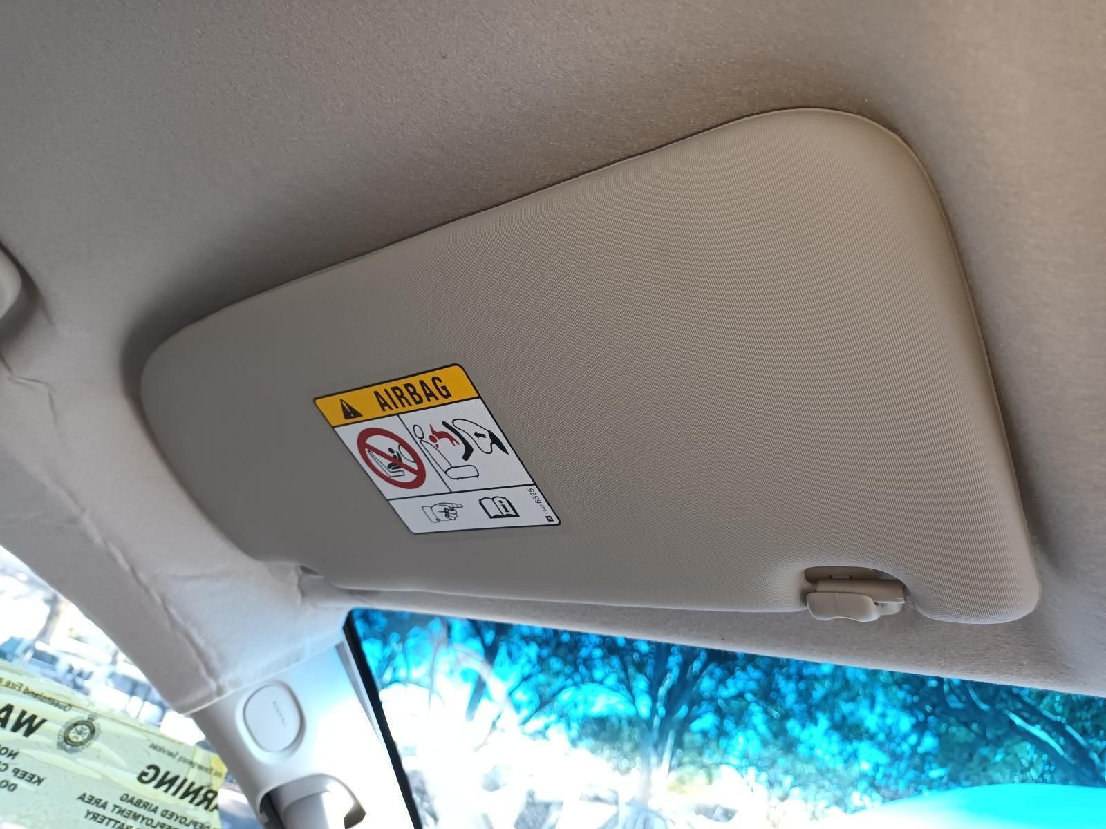 A Car Sun Visor with a Warning Label on It — South West 4WD Wreckers in Harristown, QLD