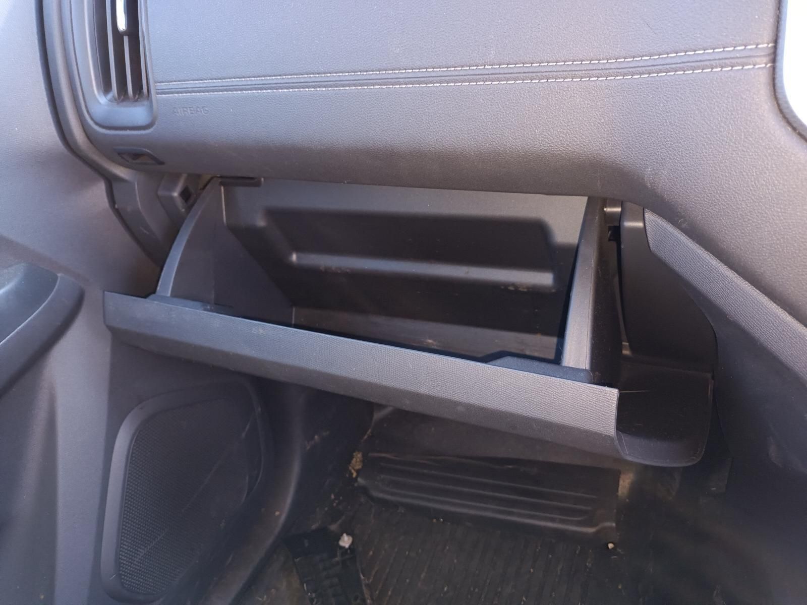 An Open Glove Box in a Car with the Door Open — South West 4WD Wreckers in Harristown, QLD