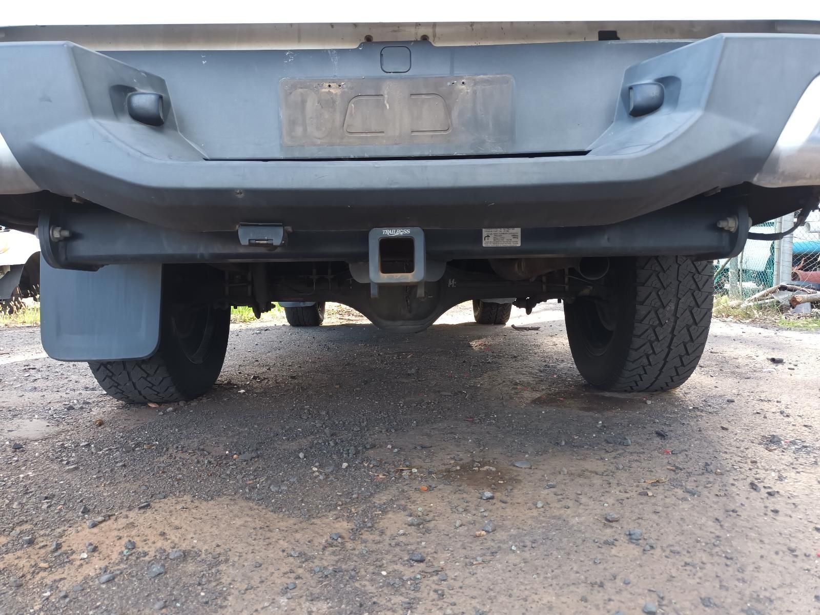 The Back End of a Truck is Shown With a Tow Hook — South West 4WD Wreckers In Harristown, QLD