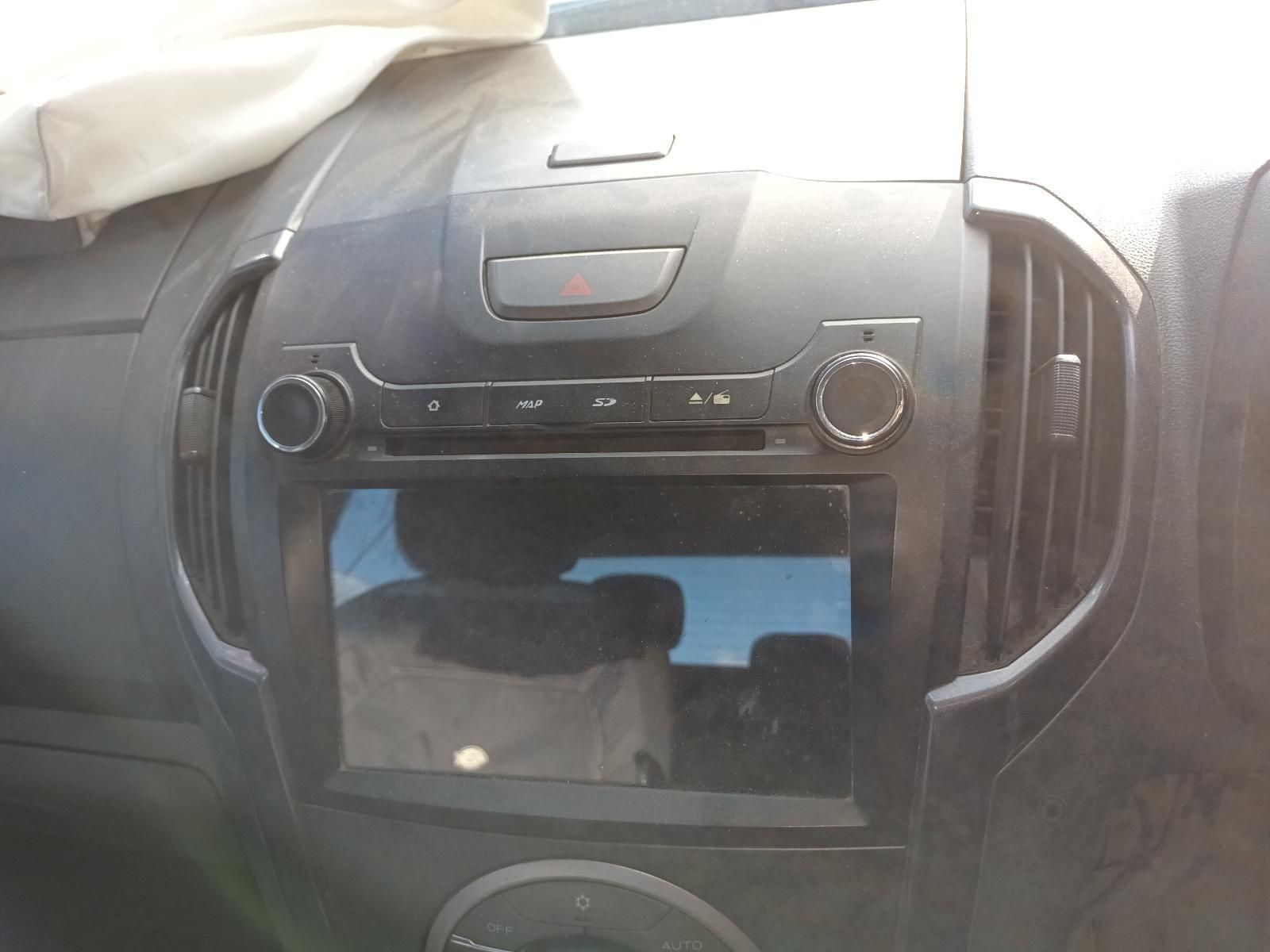 A Car Dashboard With a Radio and Air Vents — South West 4WD Wreckers In Harristown, QLD