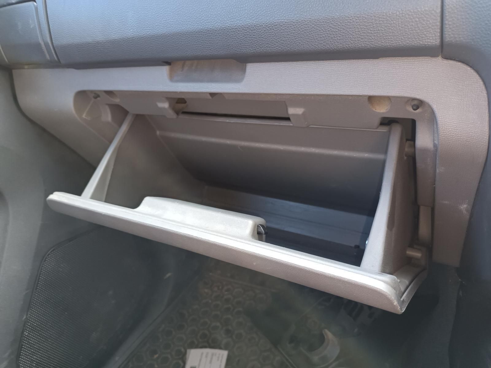 A Glove Box in a Car is Open and Empty — South West 4WD Wreckers In Harristown, QLD