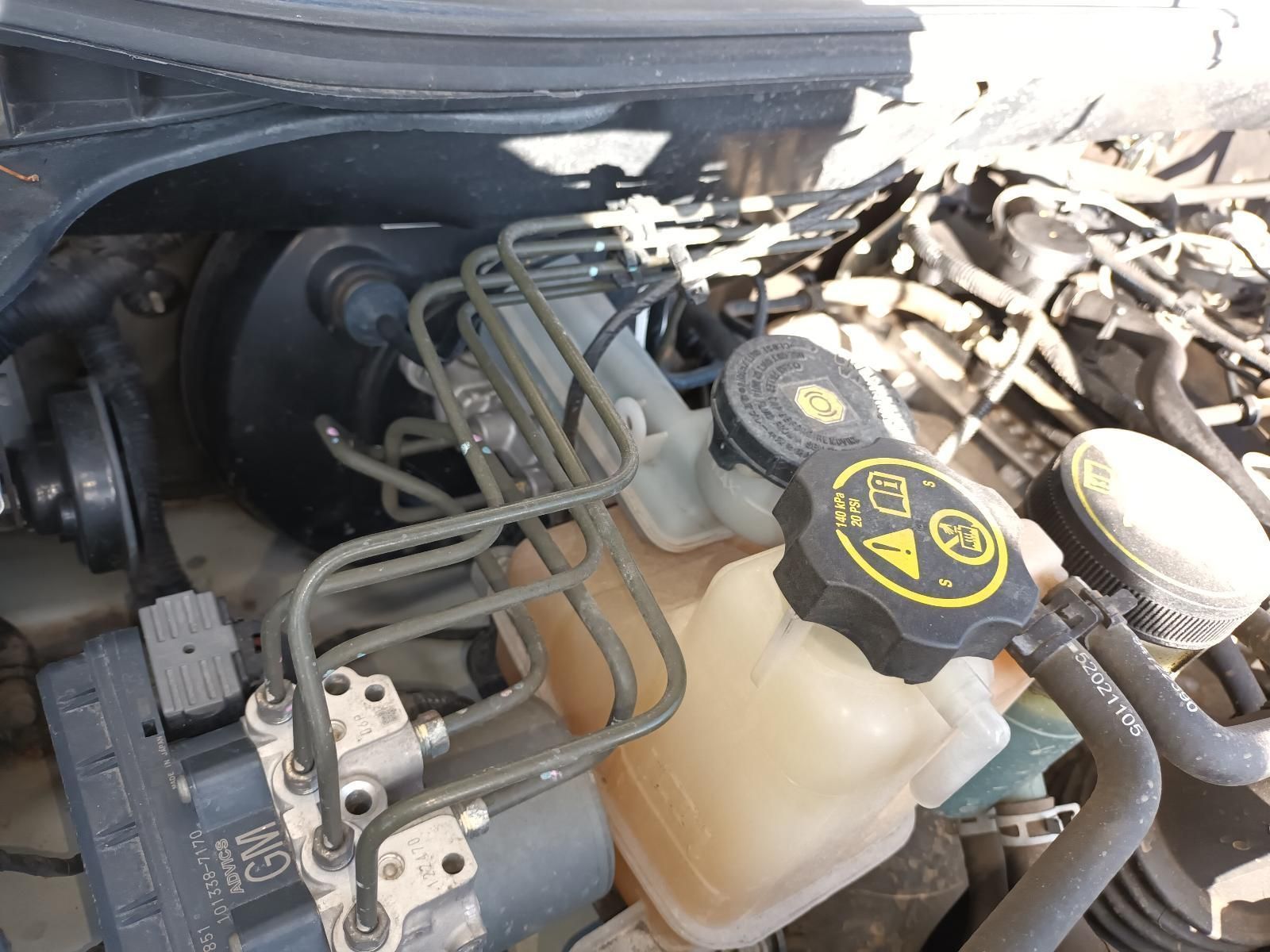 A Close Up of a Car Engine With a Brake Fluid Reservoir — South West 4WD Wreckers In Harristown, QLD