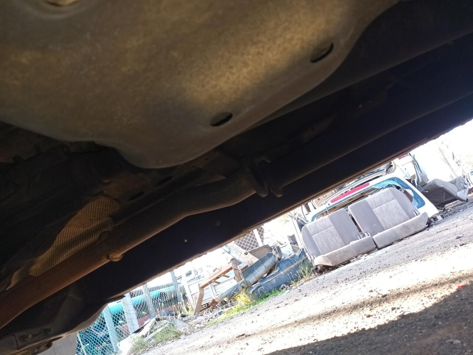 A Close Up of the Underside of a Car in a Parking Lot — South West 4WD Wreckers In Harristown, QLD