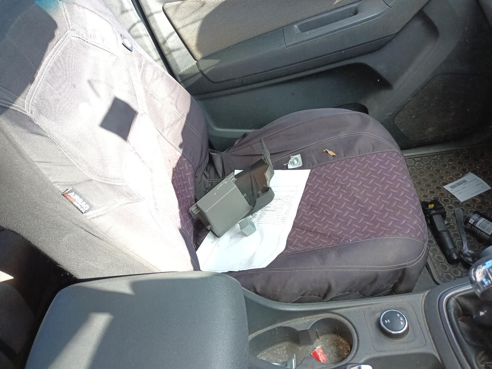A Car Seat With a Broken Seat Belt on It — South West 4WD Wreckers In Harristown, QLD