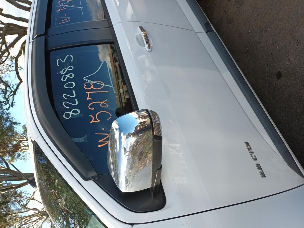 A White Car With a Sticker on the Windshield That Says 58293 — South West 4WD Wreckers In Harristown, QLD