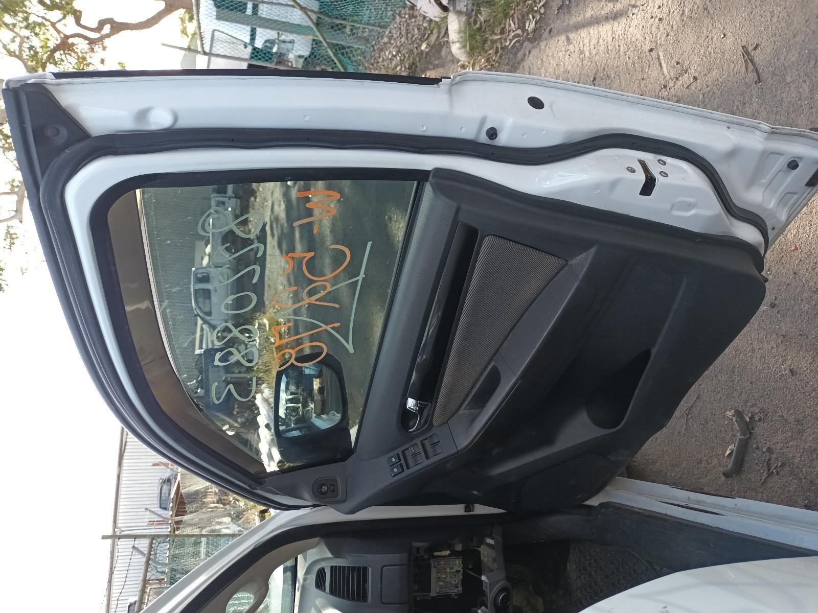 A White Car With the Door Open and a License Plate That Says Scf — South West 4WD Wreckers In Harristown, QLD