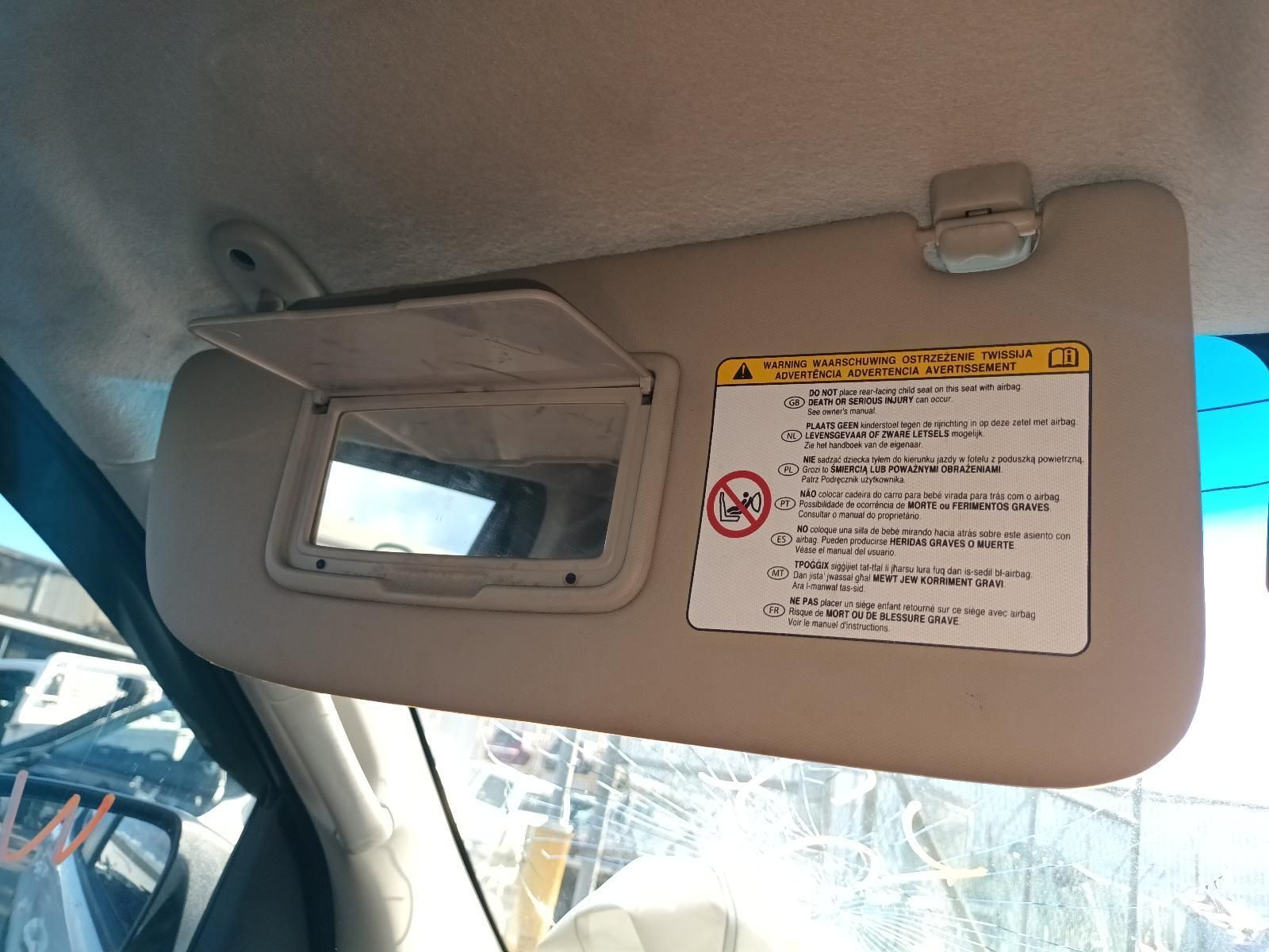 A Car Sun Visor With a Warning Label on It — South West 4WD Wreckers In Harristown, QLD