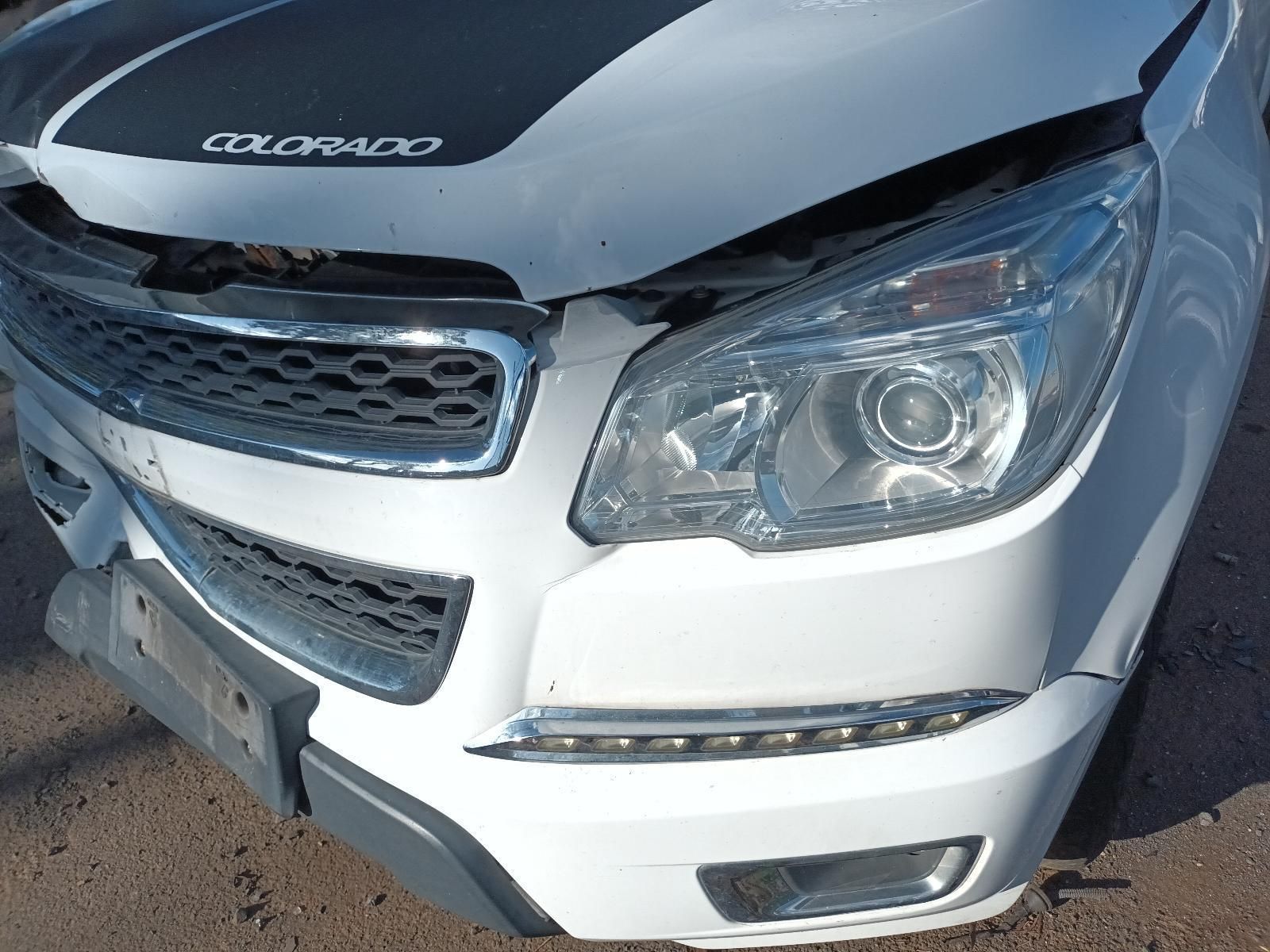 A White Car With the Hood Up and the Word Colorado on the Hood — South West 4WD Wreckers In Harristown, QLD