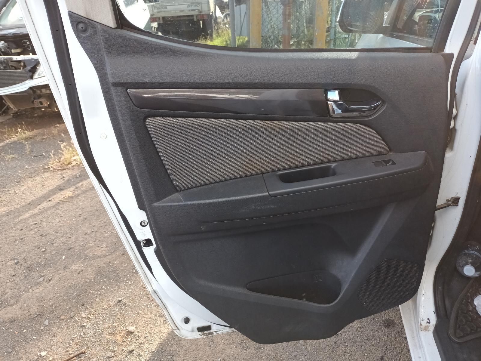 A White Car With the Door Open is Parked on the Side of the Road — South West 4WD Wreckers In Harristown, QLD