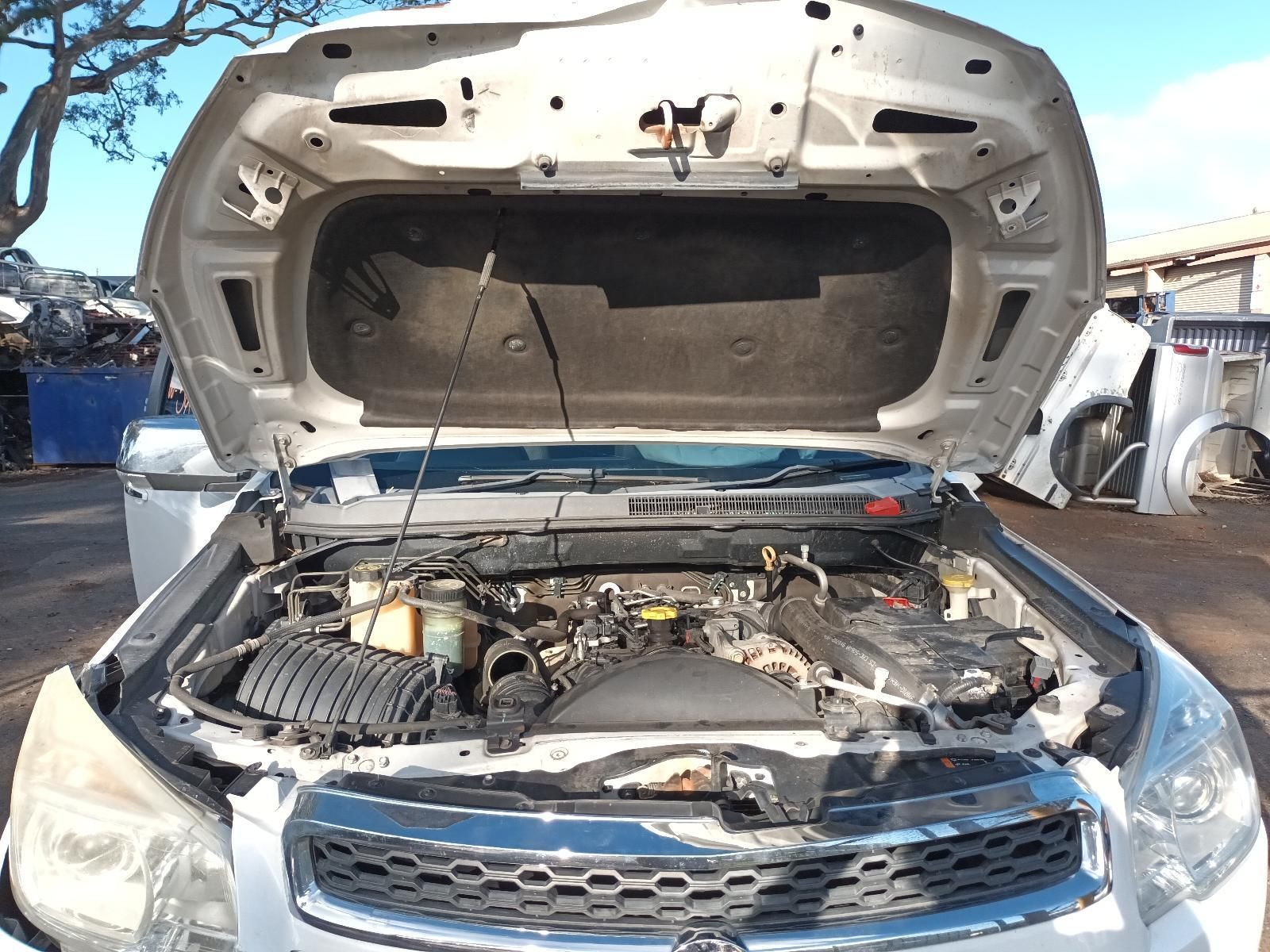 The Hood of a Car is Open and the Engine is Visible — South West 4WD Wreckers In Harristown, QLD