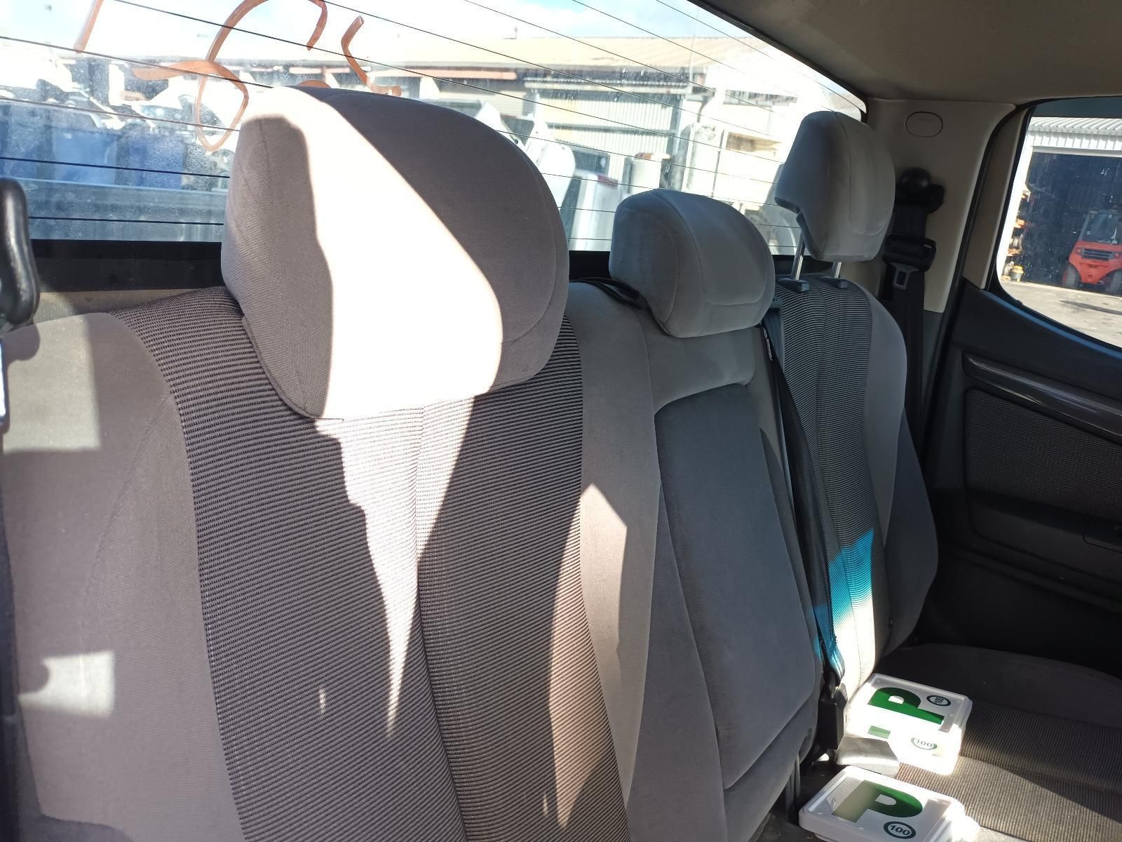 The Back Seat of a Car With a Headrest and Seat Belts — South West 4WD Wreckers In Harristown, QLD