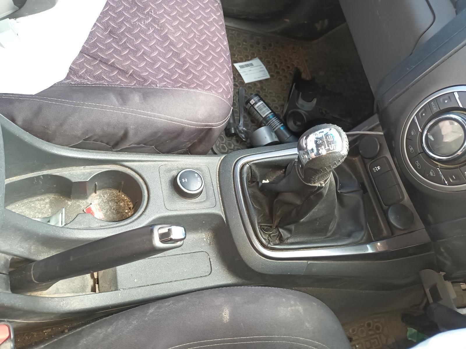 A Close Up of a Car 's Center Console With a Cup Holder and a Shifter — South West 4WD Wreckers In Harristown, QLD