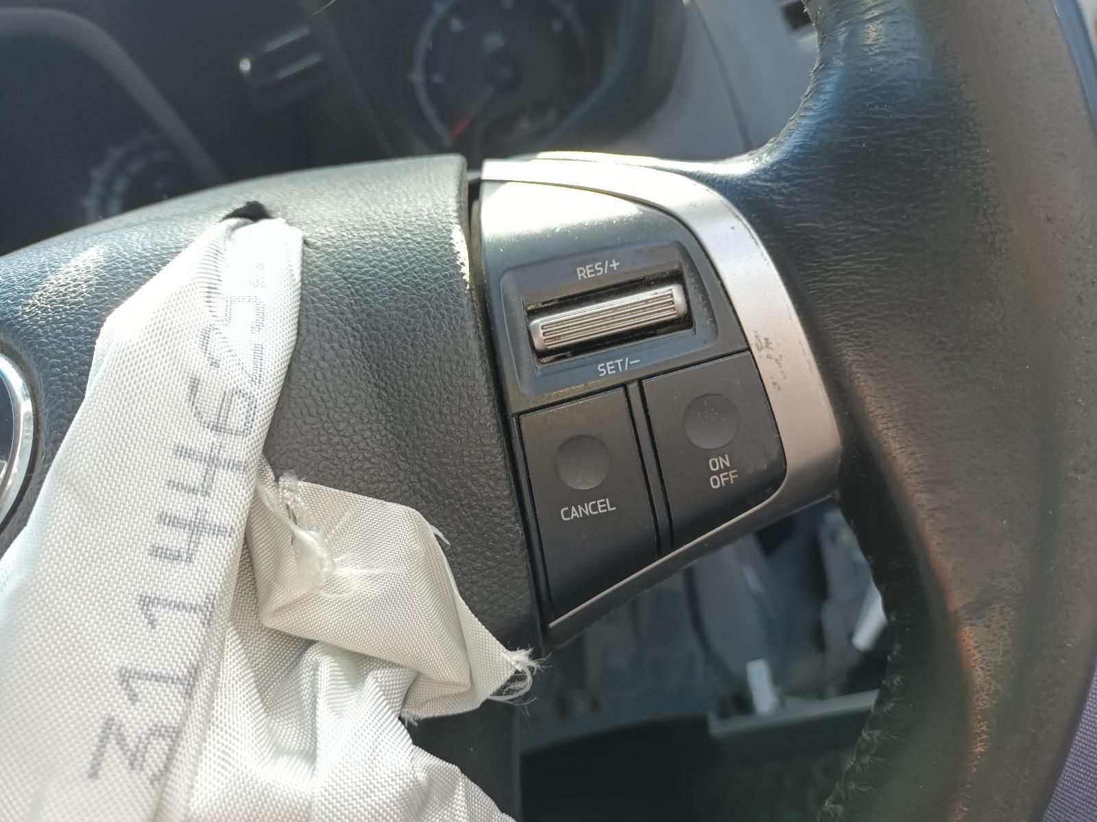 A Close Up of a Car Steering Wheel With a Glove on It — South West 4WD Wreckers In Harristown, QLD