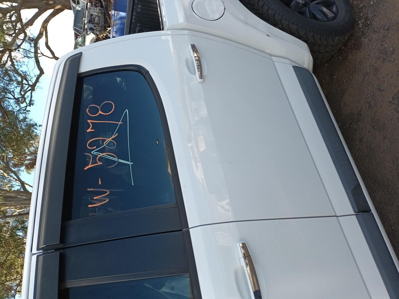 A White Truck is Parked on the Side of the Road — South West 4WD Wreckers In Harristown, QLD