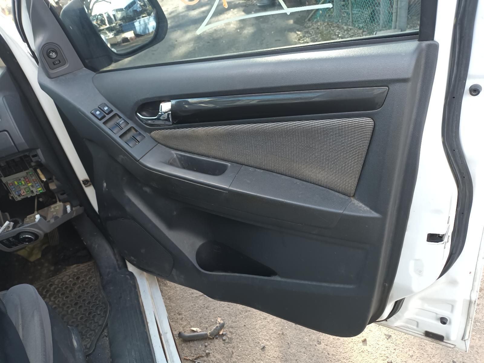 The Inside of a White Car With the Door Open — South West 4WD Wreckers In Harristown, QLD