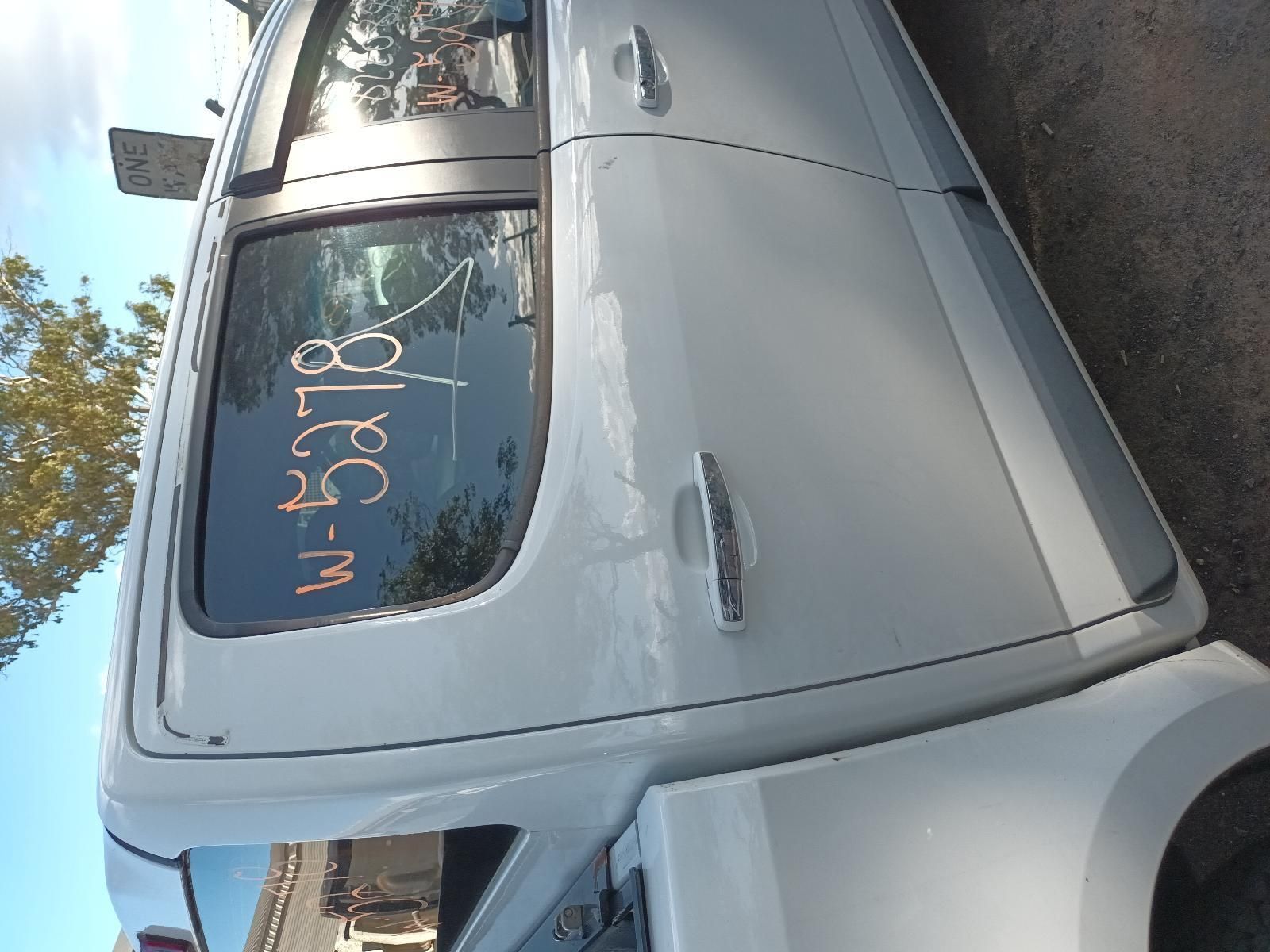 A White Truck is Parked on the Side of the Road — South West 4WD Wreckers In Harristown, QLD