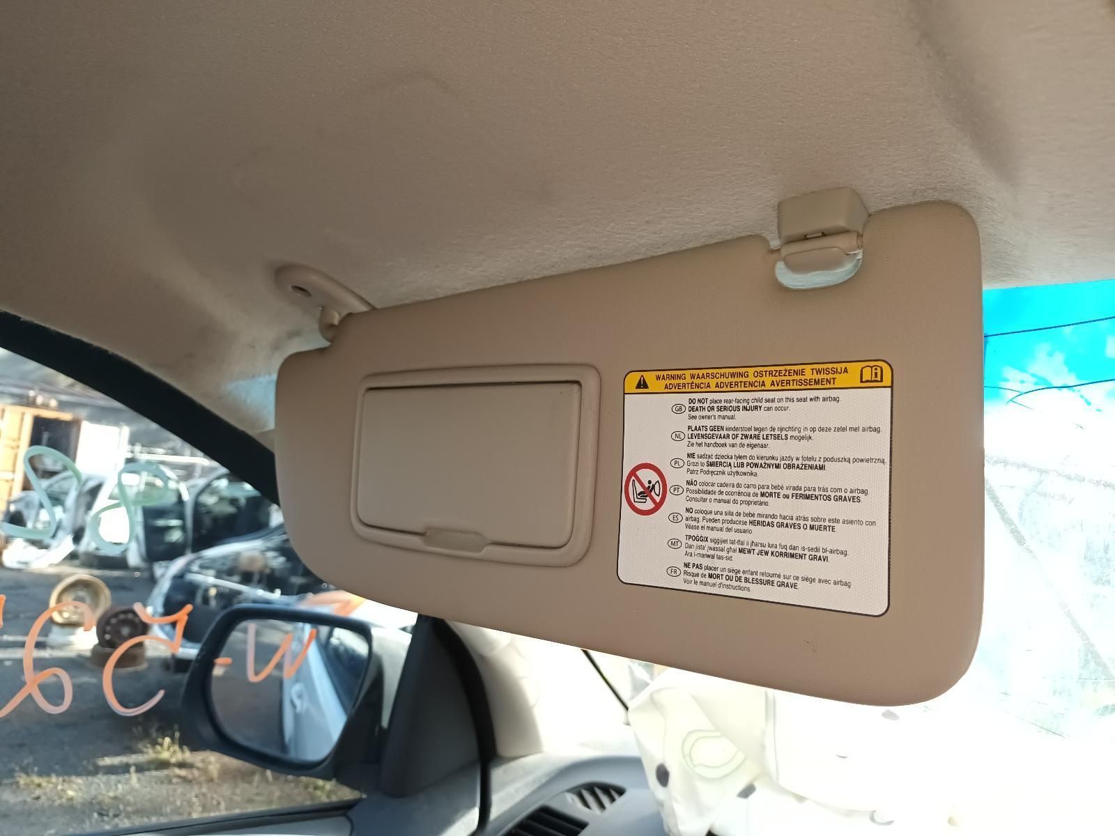 A Sun Visor is Attached to the Ceiling of a Car — South West 4WD Wreckers In Harristown, QLD