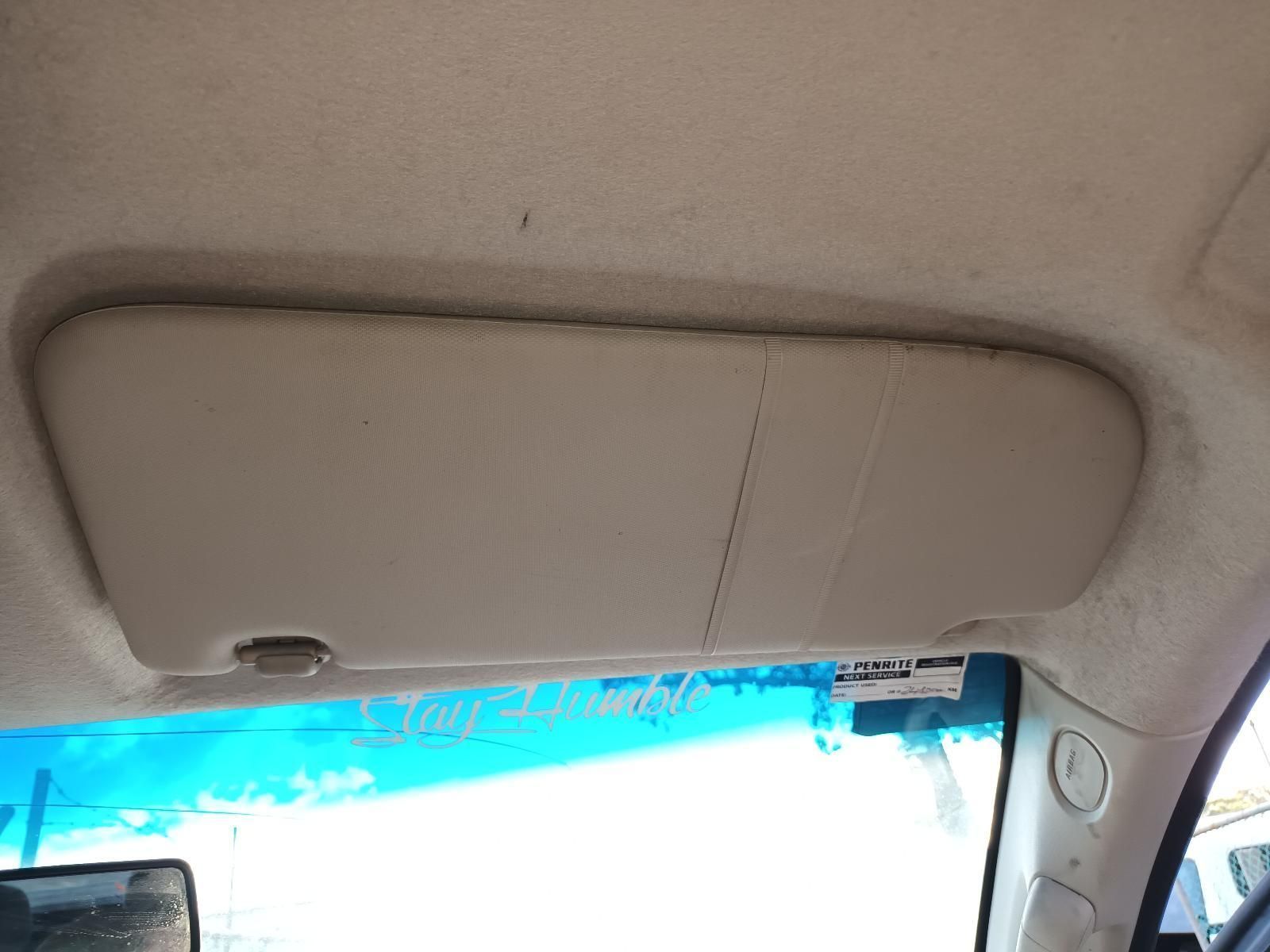 A Sun Visor is Hanging From the Ceiling of a Car — South West 4WD Wreckers In Harristown, QLD