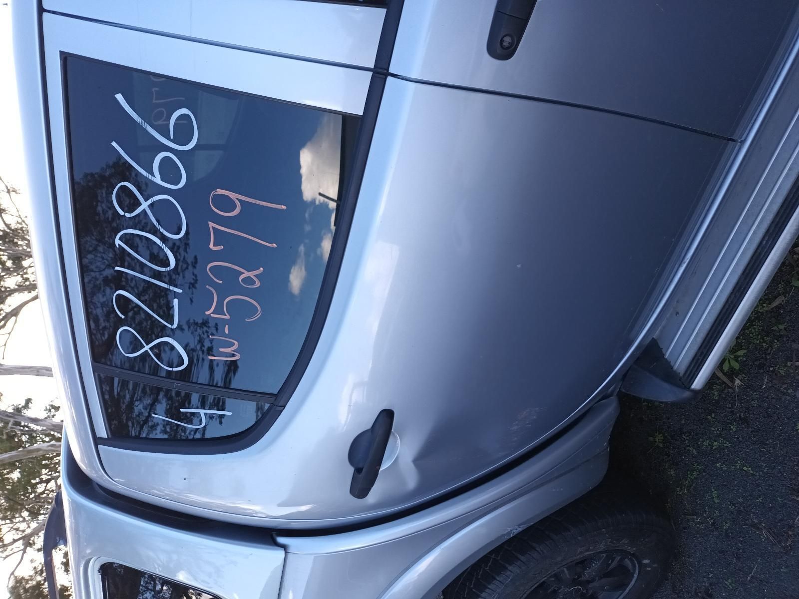 A Silver Car is Parked on the Side of the Road — South West 4WD Wreckers in Harristown, QLD