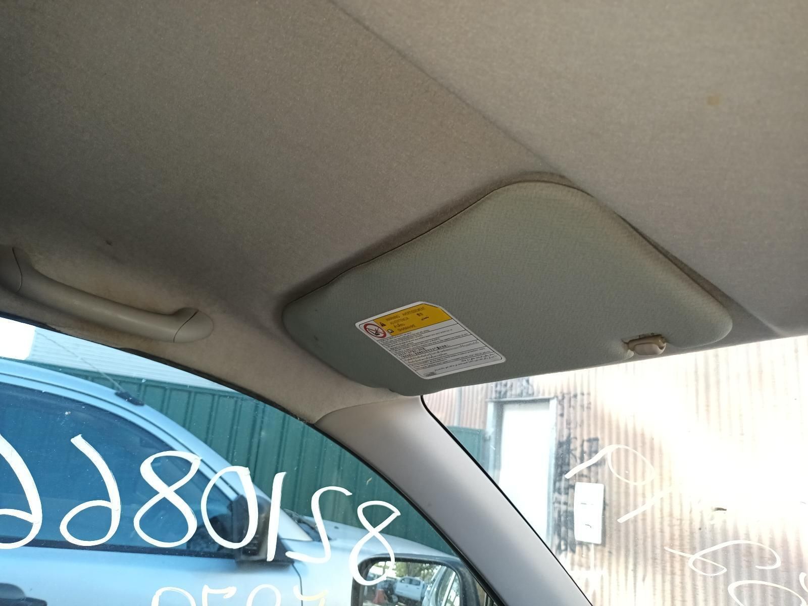 A Car with a Sun Visor on the Roof is for Sale — South West 4WD Wreckers in Harristown, QLD