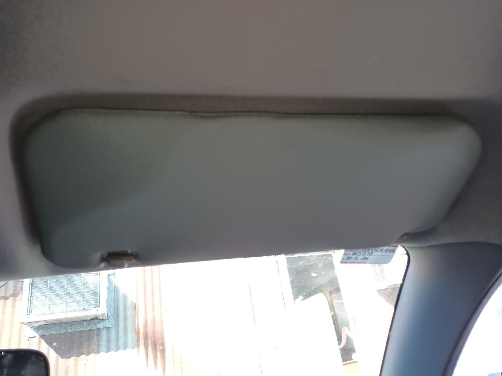 A Sun Visor is Hanging from the Ceiling of a Car — South West 4WD Wreckers in Harristown, QLD