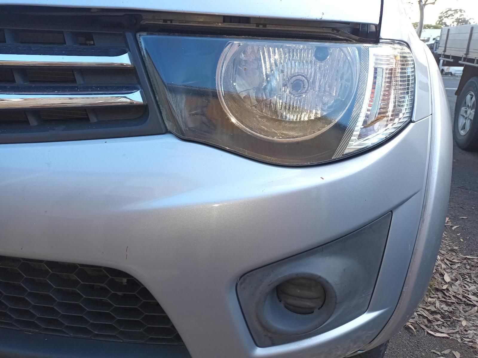 A Close Up of the Front of a Silver Car — South West 4WD Wreckers in Harristown, QLD