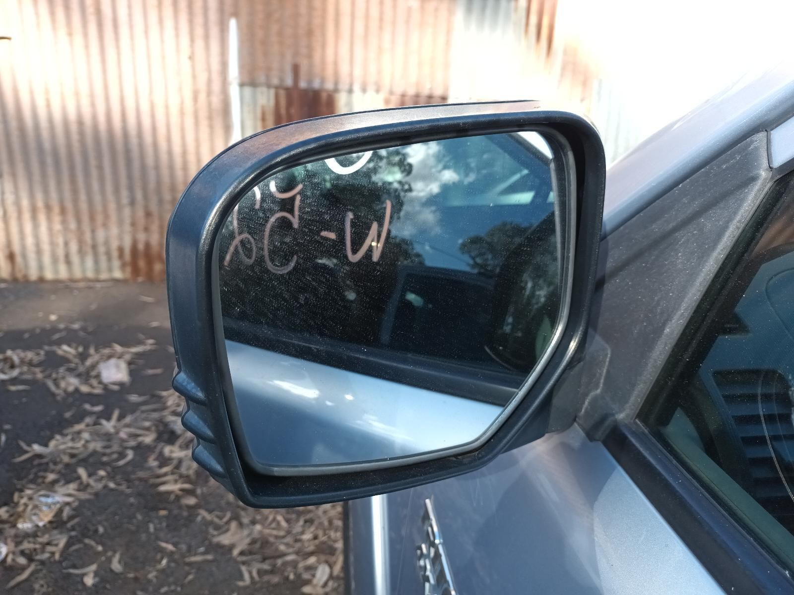 A Side View Mirror on a Car — South West 4WD Wreckers in Harristown, QLD