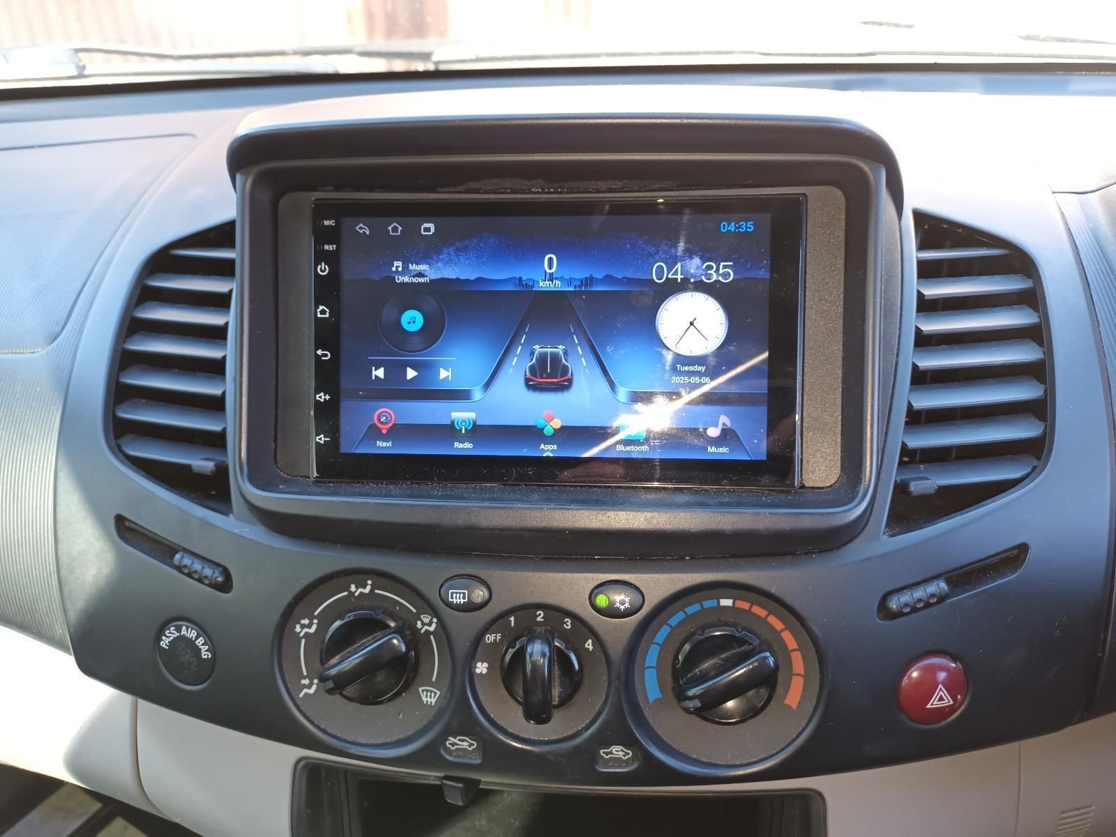 A Car Dashboard with a Radio and a Clock on It — South West 4WD Wreckers in Harristown, QLD
