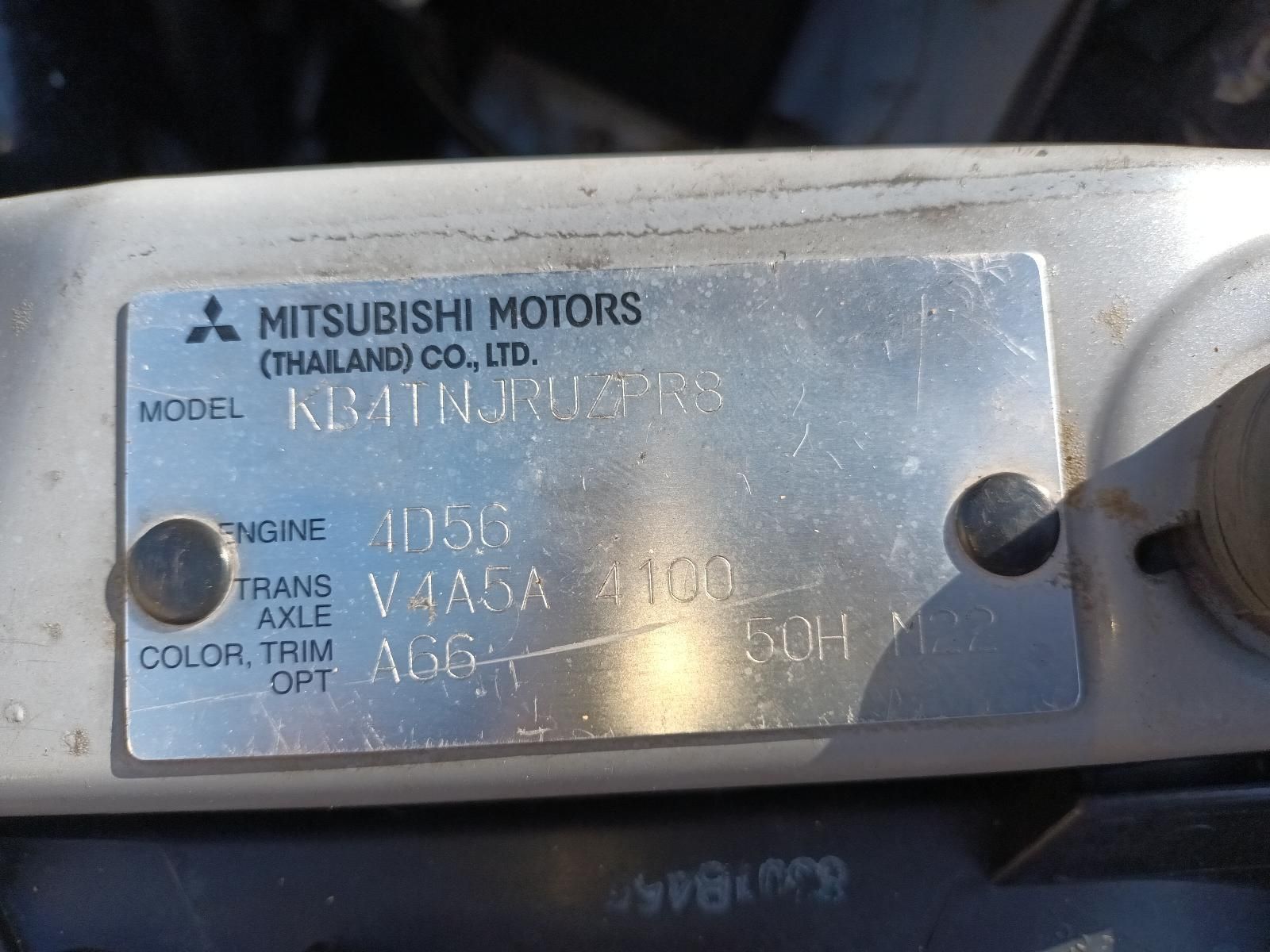 A Close Up of a Mitsubishi Motors License Plate — South West 4WD Wreckers in Harristown, QLD