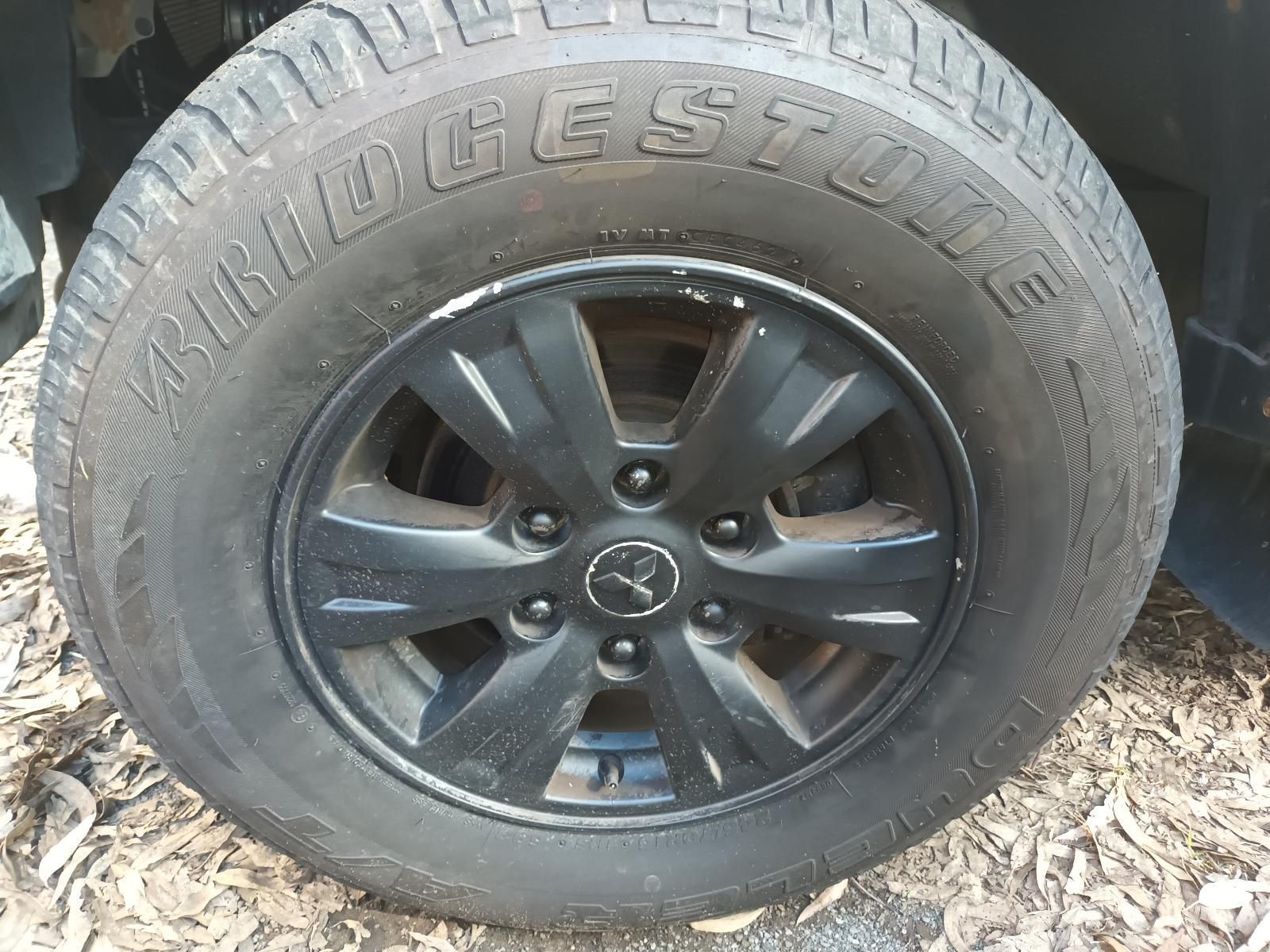 A Close Up of a Tire on a Car with a Black Rim — South West 4WD Wreckers in Harristown, QLD
