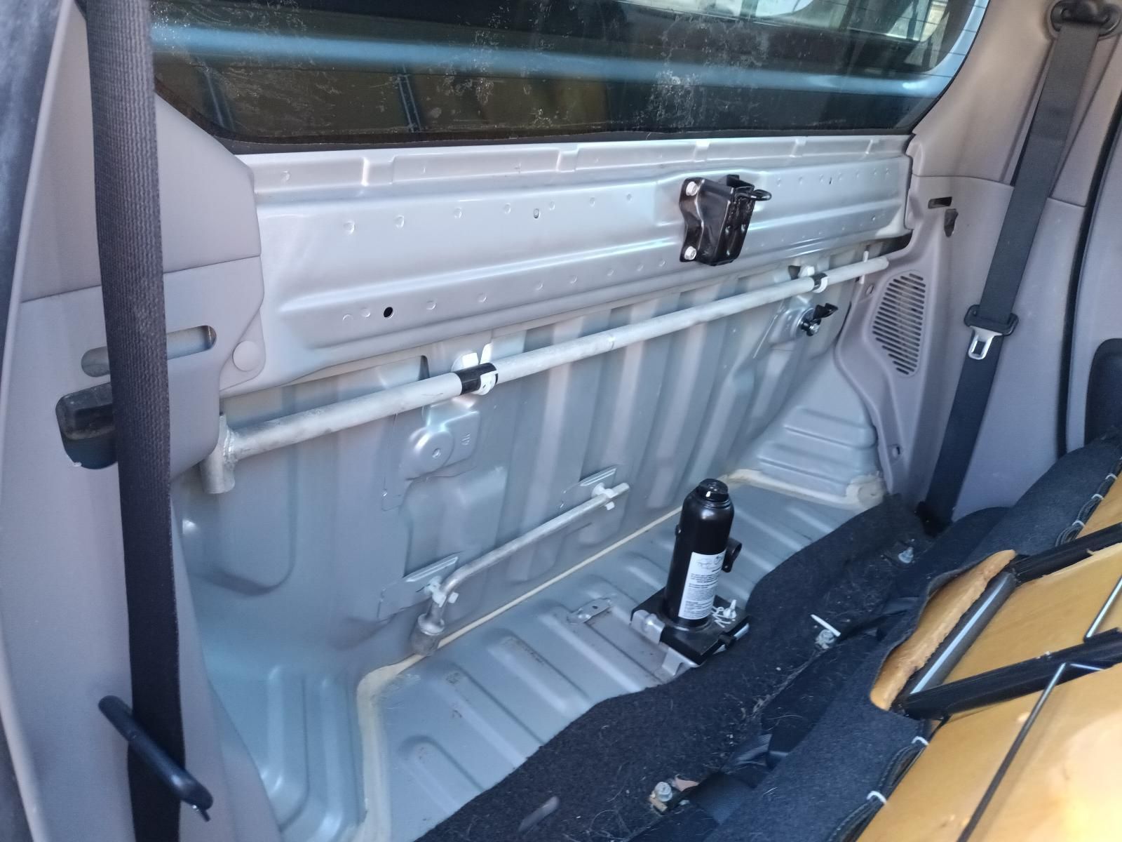 The Trunk of a Car with a Jack in It — South West 4WD Wreckers in Harristown, QLD