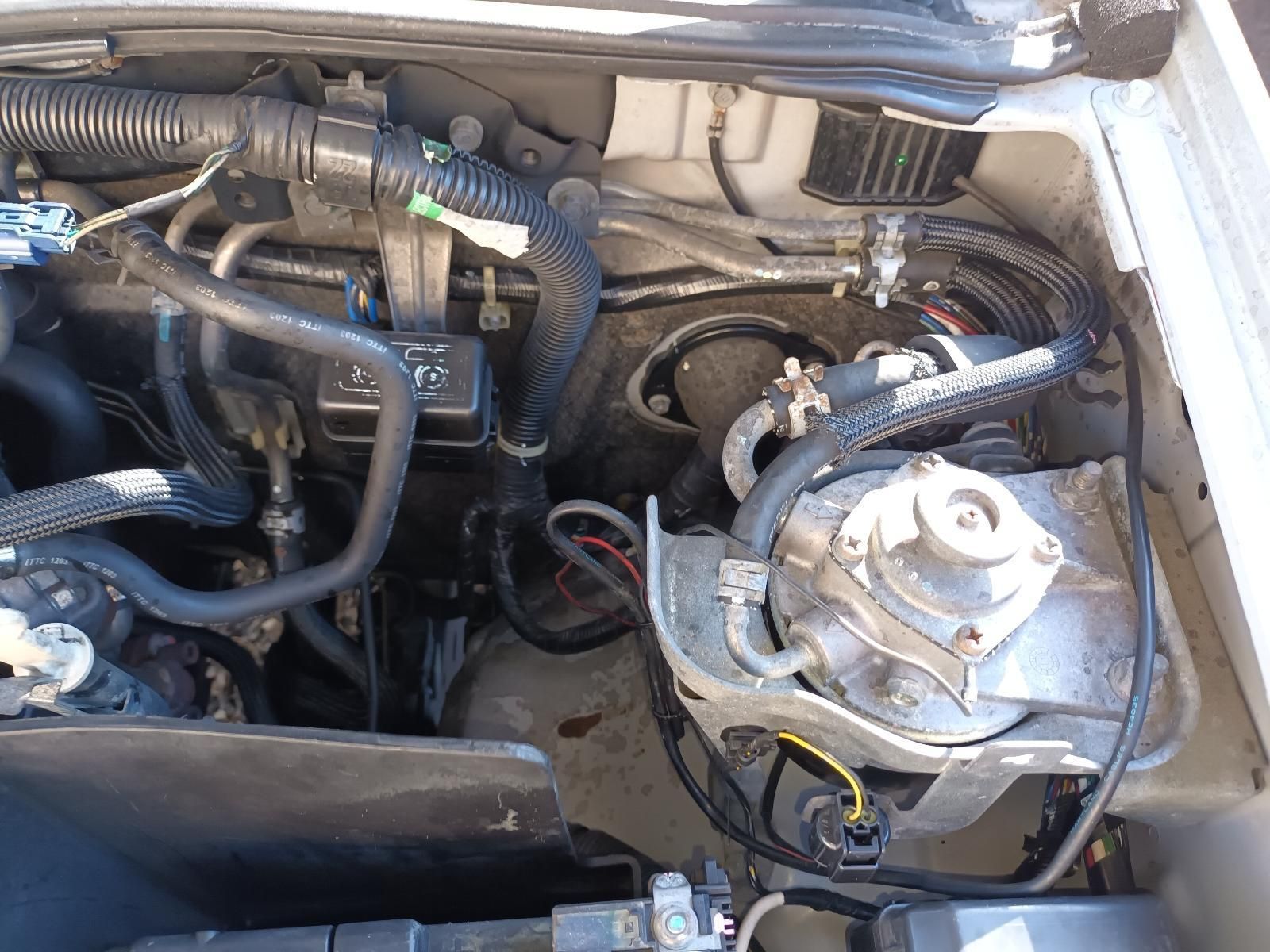 A Close Up of a Car Engine with a Lot of Wires Coming Out of It — South West 4WD Wreckers in Harristown, QLD