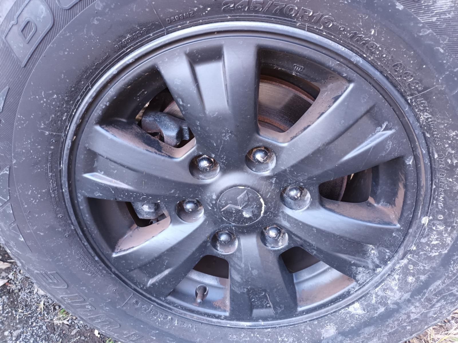 A Close Up of a Black Wheel on a Car — South West 4WD Wreckers in Harristown, QLD