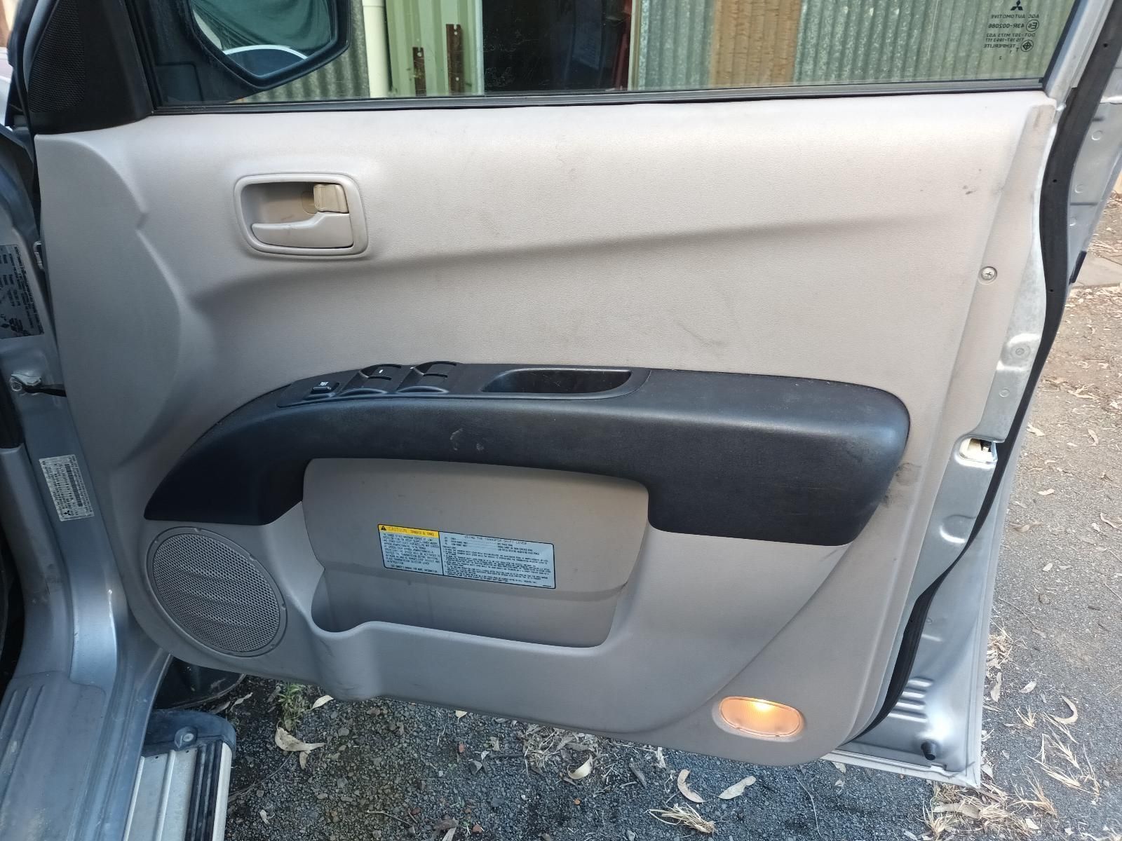 A Close Up of a Car Door with the Door Open — South West 4WD Wreckers in Harristown, QLD