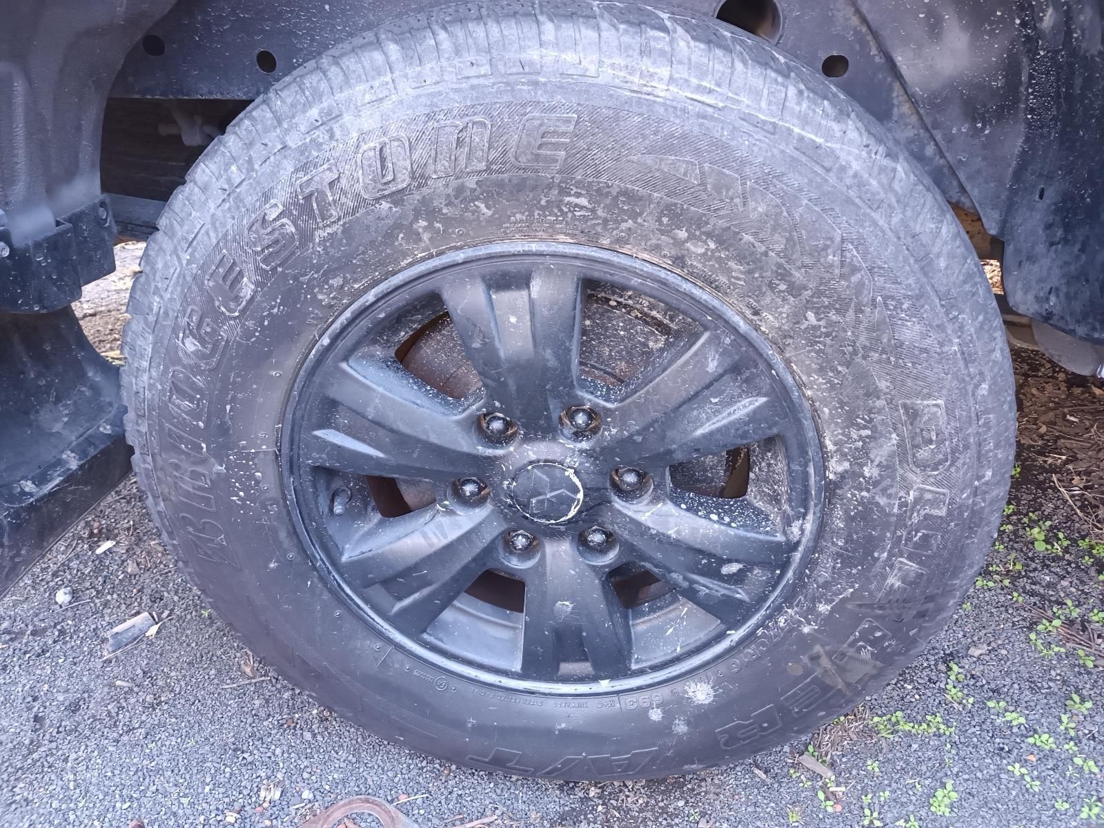 A Close Up of a Dirty Tire on a Car — South West 4WD Wreckers in Harristown, QLD