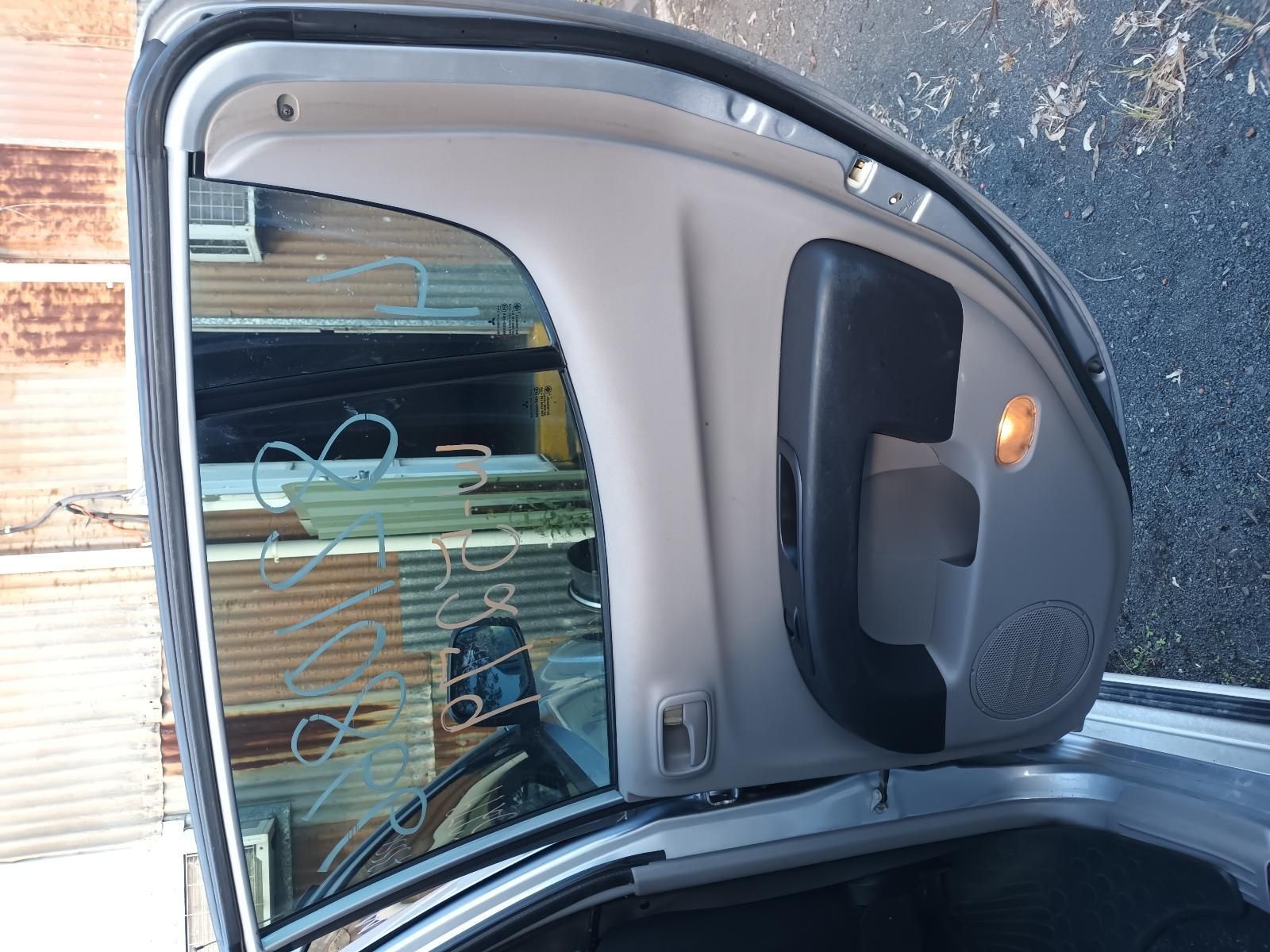 The Trunk of a Silver Car with the Door Open — South West 4WD Wreckers in Harristown, QLD