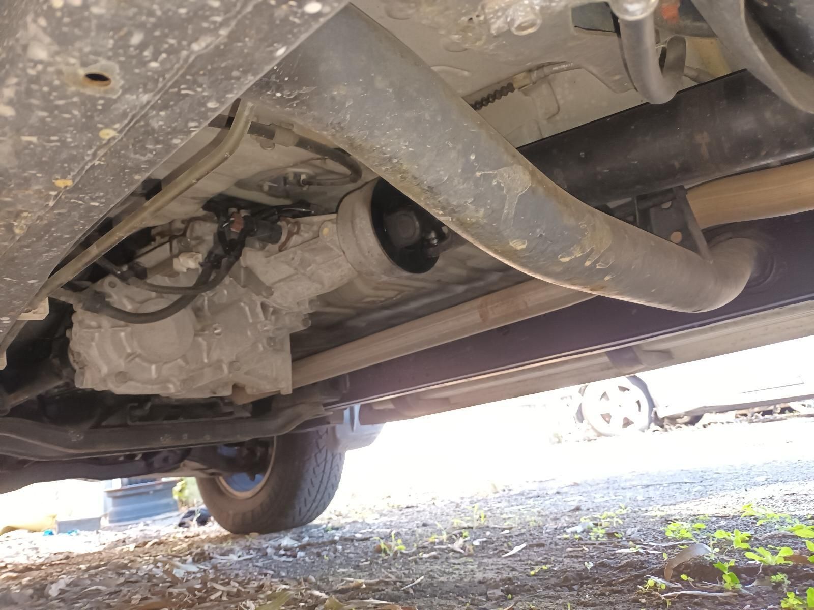 A Close Up of the Underside of a Car with an Exhaust Pipe — South West 4WD Wreckers in Harristown, QLD