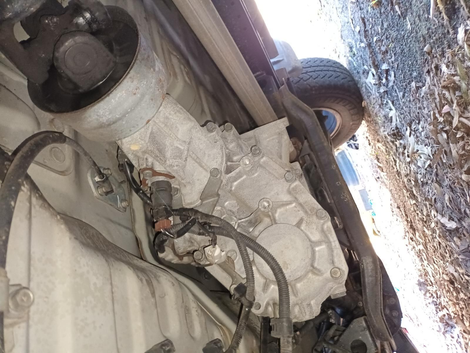A Close Up of a Car Engine with a Hose Coming Out of It — South West 4WD Wreckers in Harristown, QLD
