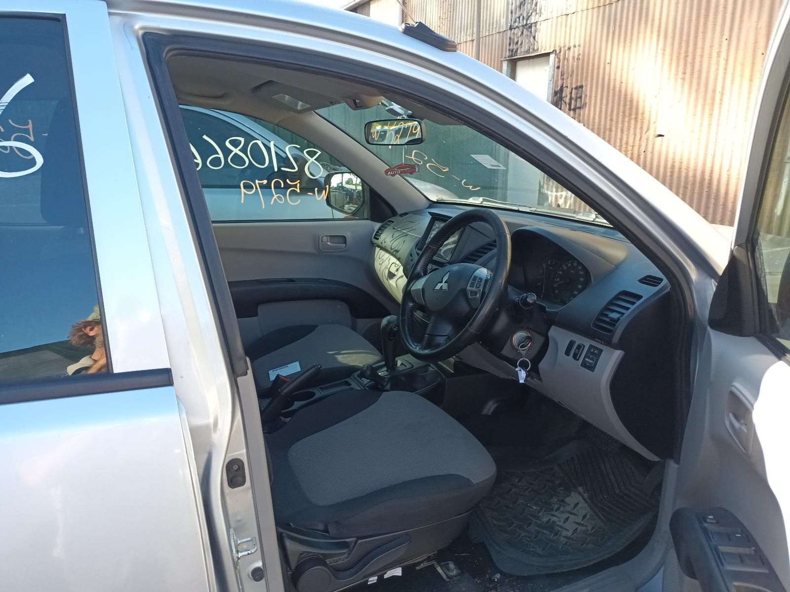 The Inside of a Silver Car with the Door Open — South West 4WD Wreckers in Harristown, QLD