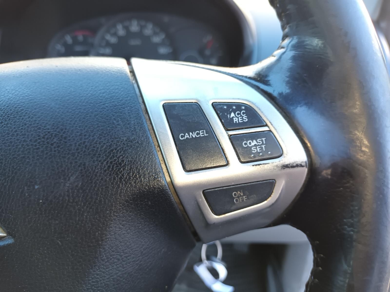 A Close Up of a Car Steering Wheel with Buttons — South West 4WD Wreckers in Harristown, QLD