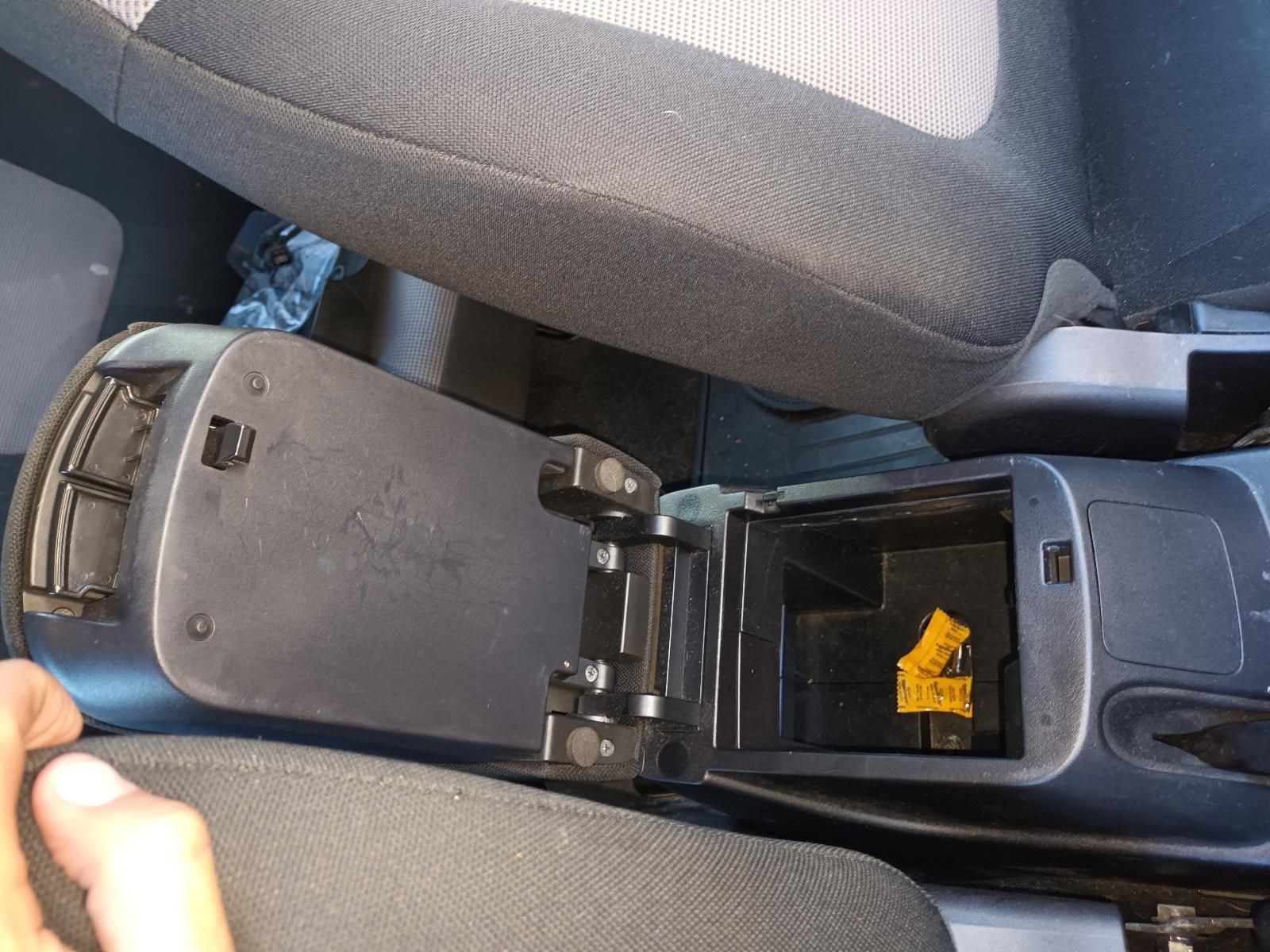 A Person is Sitting in a Car with the Arm Rest Open — South West 4WD Wreckers in Harristown, QLD