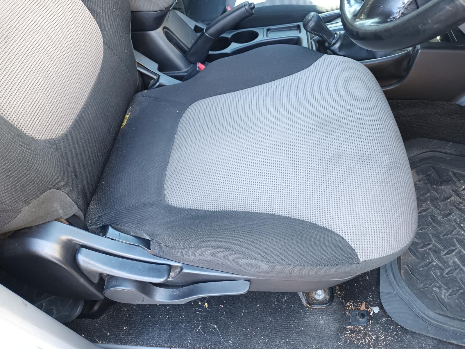 A Close Up of a Car Seat with a Steering Wheel in the Background — South West 4WD Wreckers in Harristown, QLD
