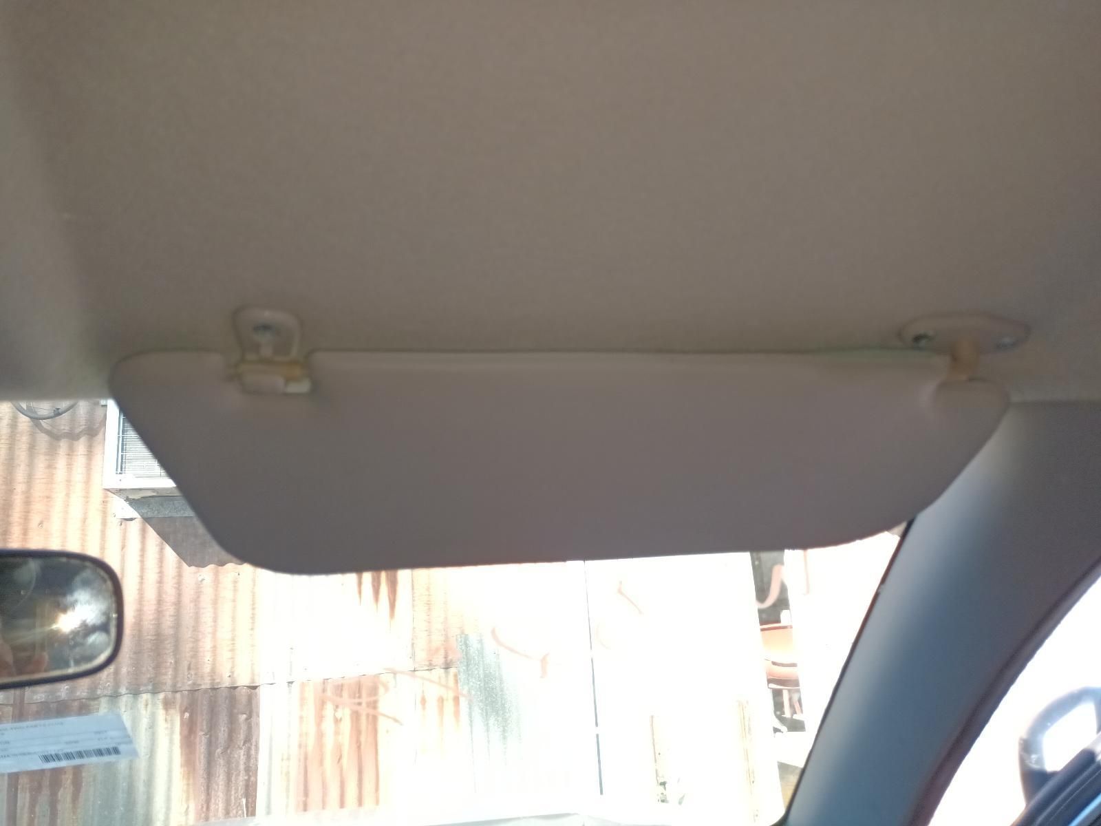 A Sun Visor is Attached to the Ceiling of a Car — South West 4WD Wreckers in Harristown, QLD 