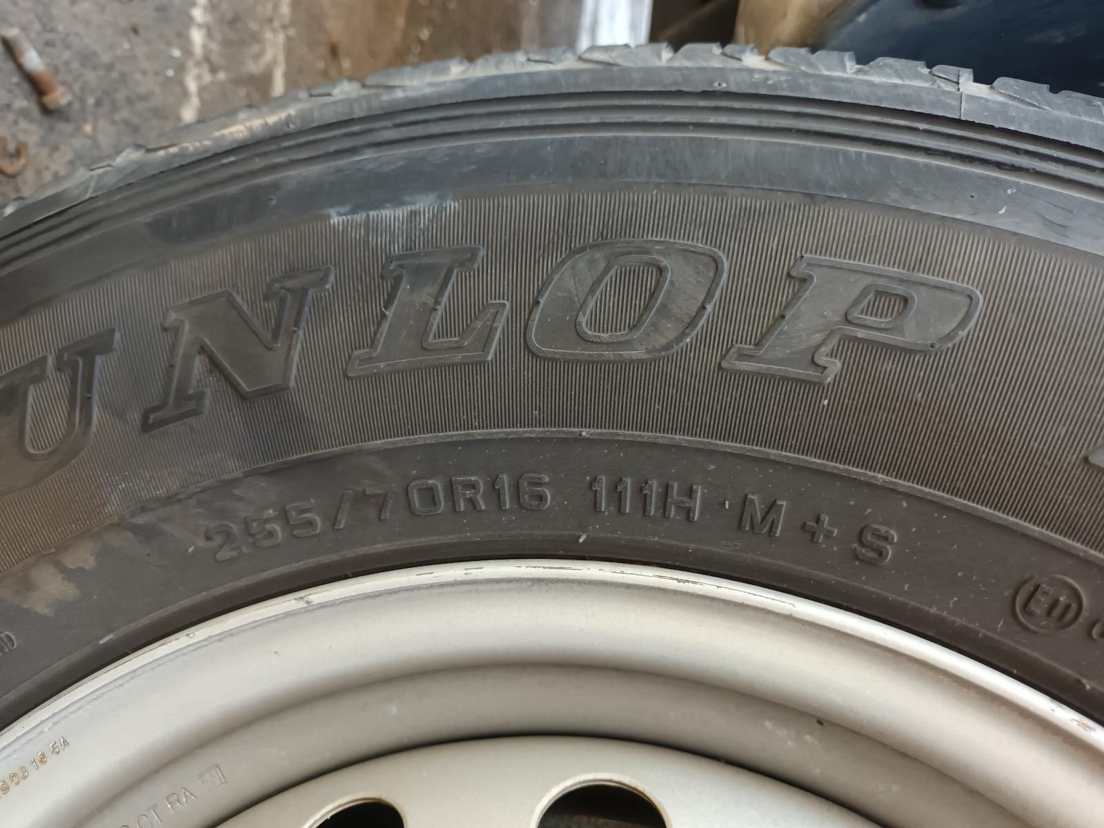 A Close Up of a Dunlop Tire on a Wheel — South West 4WD Wreckers in Harristown, QLD