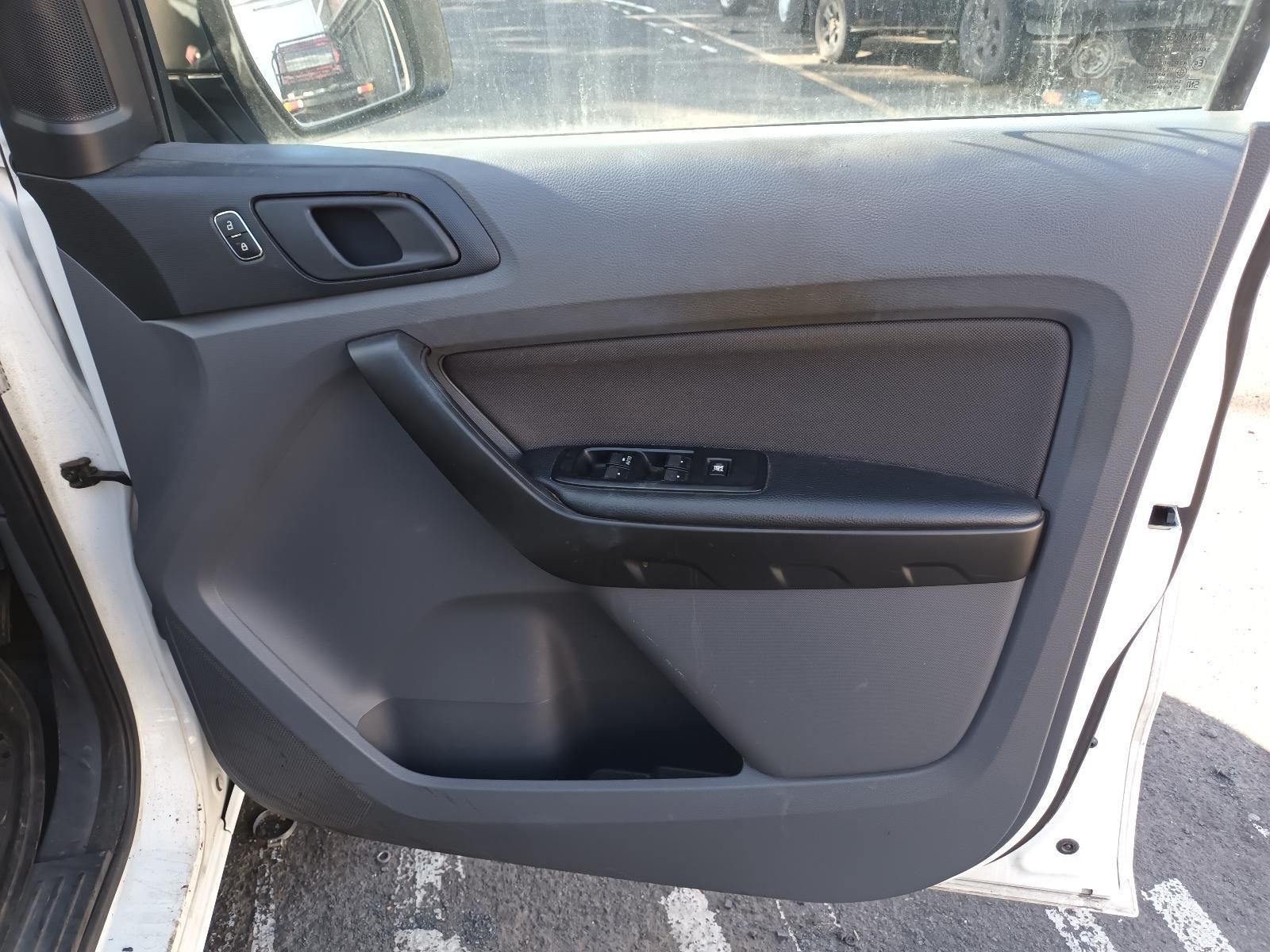 A White Car with the Door Open and a Black Door Panel — South West 4WD Wreckers in Harristown, QLD