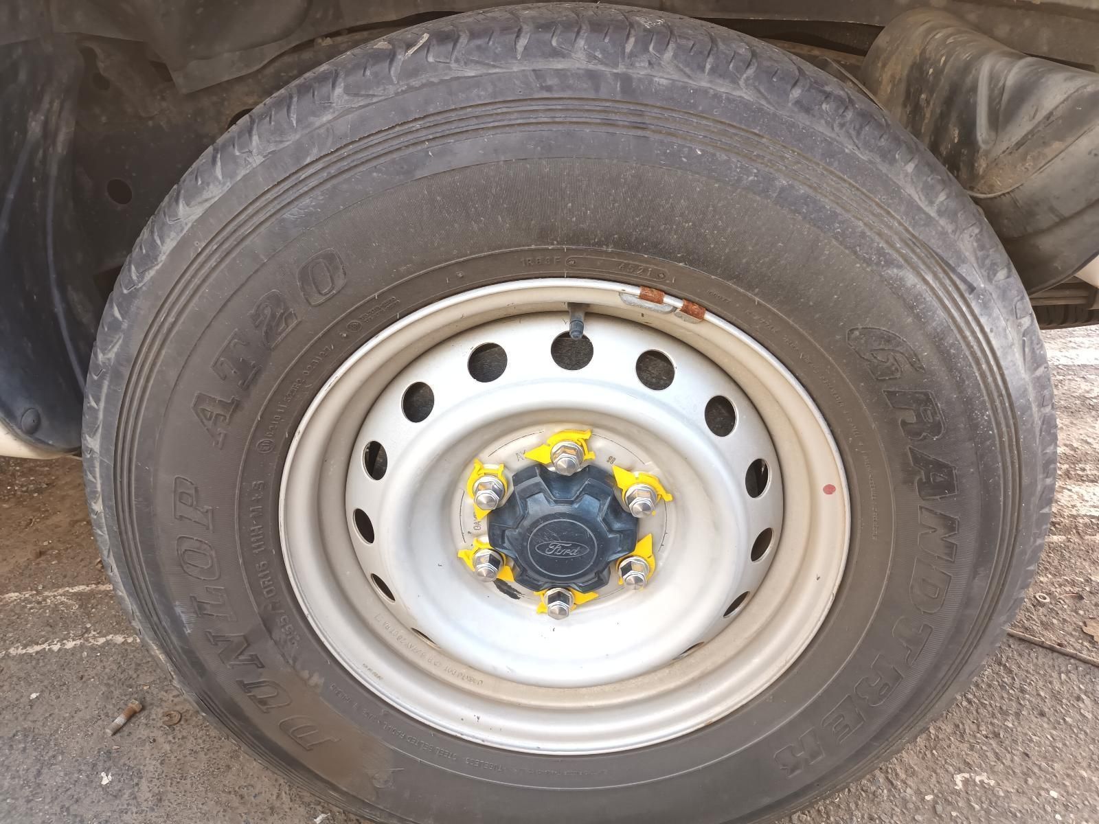 A Car Tire with a Metal Rim — South West 4WD Wreckers in Harristown, QLD