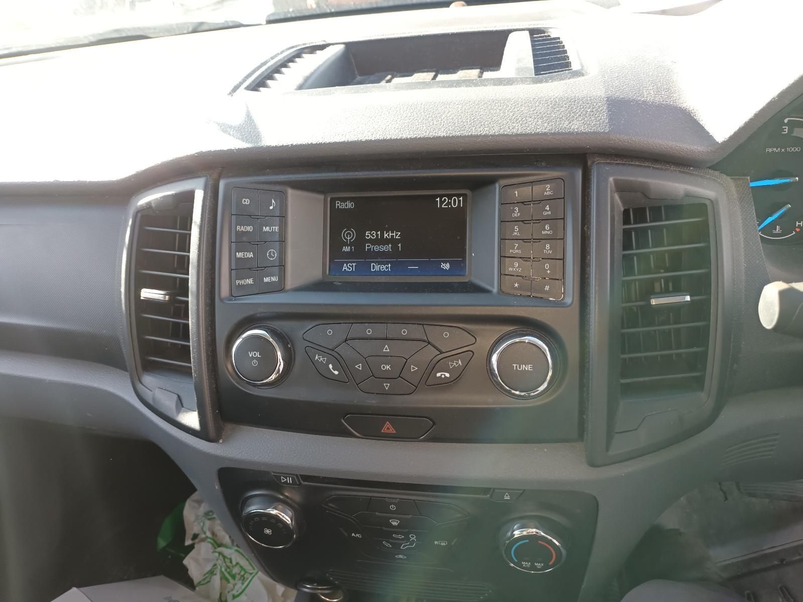 A Close Up of the Dashboard of a Car with a Radio — South West 4WD Wreckers in Harristown, QLD