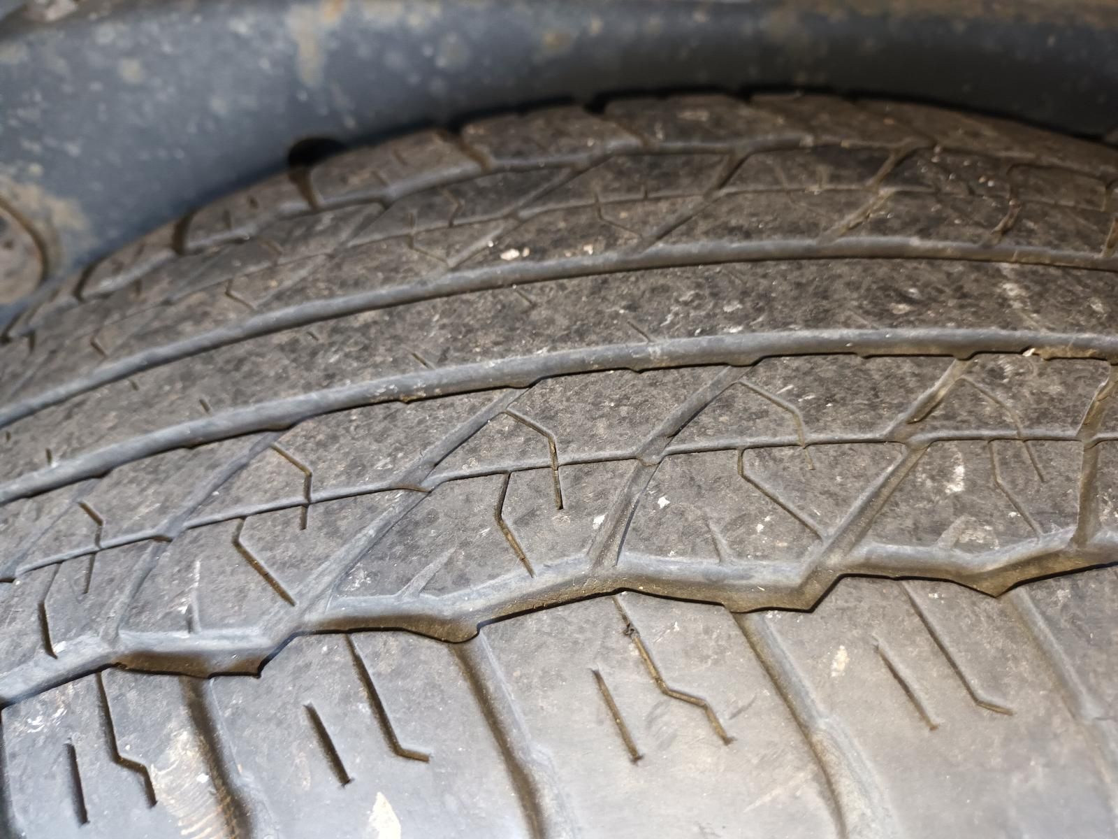A Close Up of a Dirty Tire on a Car — South West 4WD Wreckers in Harristown, QLD